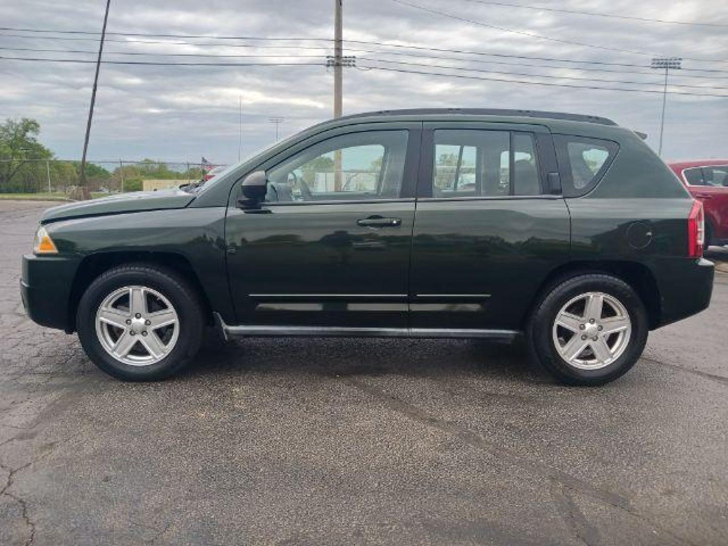 2010 Natural Green Pearl Jeep Compass Sport 4WD (1J4NF4FB7AD) with an 2.4L L4 DOHC 16V engine, located at 1865 W 2nd St., Xenia, OH, 45385, (937) 372-7777, 39.681259, -83.961945 - Photo#2