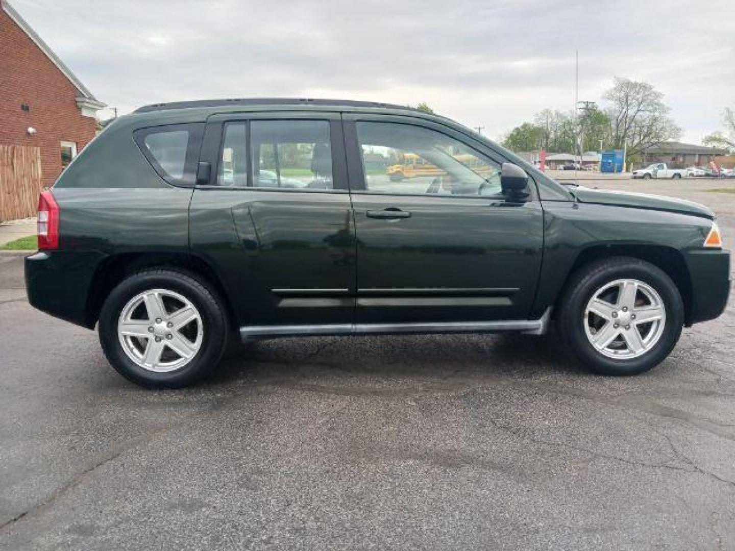 2010 Natural Green Pearl Jeep Compass Sport 4WD (1J4NF4FB7AD) with an 2.4L L4 DOHC 16V engine, located at 1865 W 2nd St., Xenia, OH, 45385, (937) 372-7777, 39.681259, -83.961945 - Photo#3