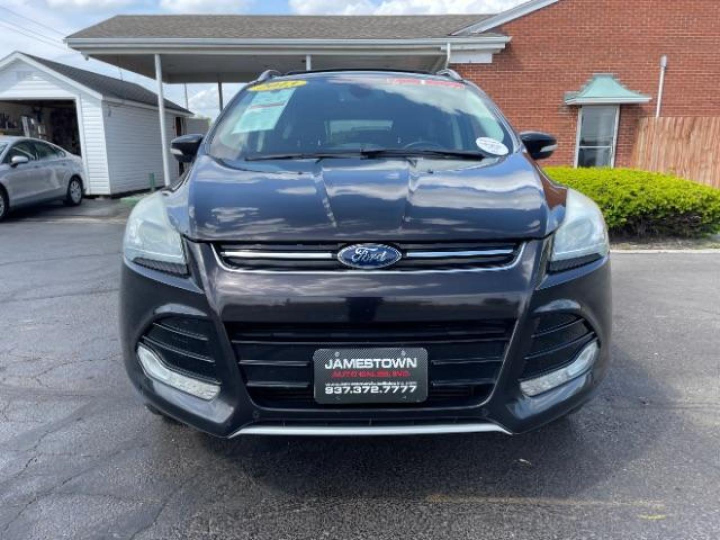 2013 Tuxedo Black Ford Escape Titanium FWD (1FMCU0J98DU) with an 2.0L L4 DOHC 16V engine, 6-Speed Automatic transmission, located at 1865 W 2nd St., Xenia, OH, 45385, (937) 372-7777, 39.681259, -83.961945 - Photo#4