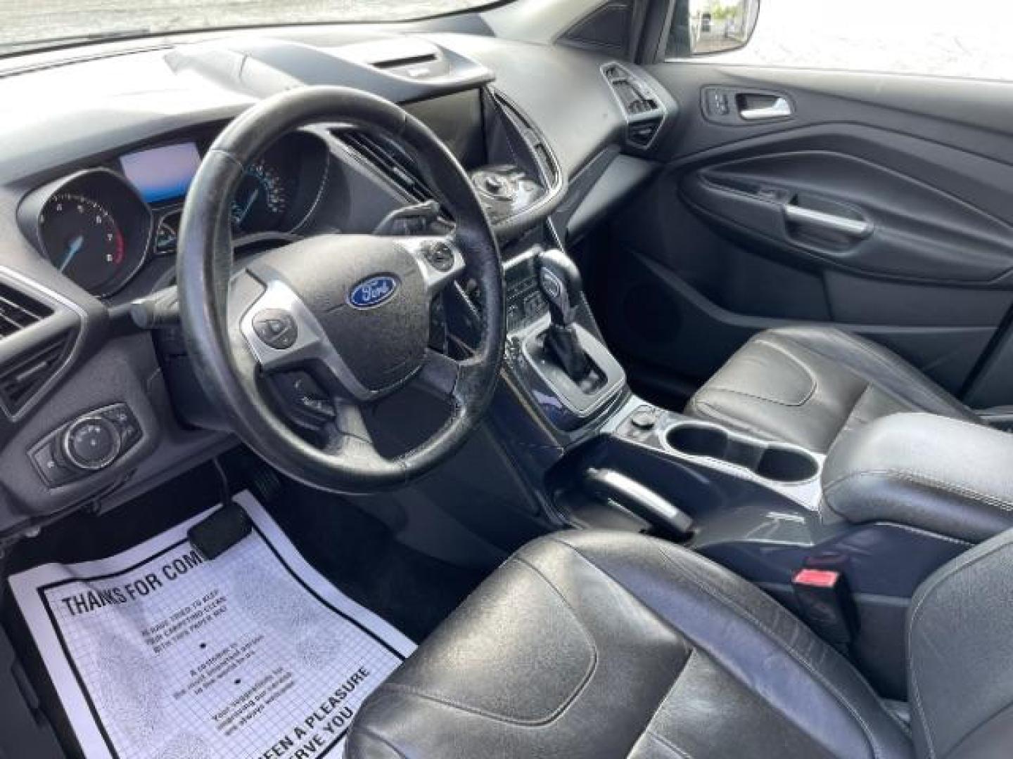 2013 Tuxedo Black Ford Escape Titanium FWD (1FMCU0J98DU) with an 2.0L L4 DOHC 16V engine, 6-Speed Automatic transmission, located at 1865 W 2nd St., Xenia, OH, 45385, (937) 372-7777, 39.681259, -83.961945 - Photo#5