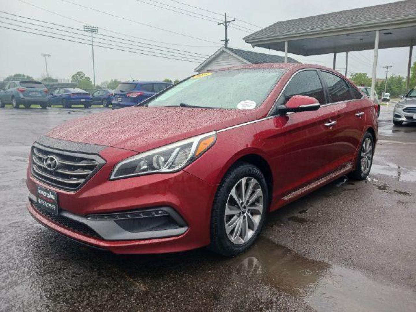 2015 Red Hyundai Sonata Sport (5NPE34AF7FH) with an 2.4L L4 DOHC 16V engine, 6-Speed Automatic transmission, located at 1865 W 2nd St., Xenia, OH, 45385, (937) 372-7777, 39.681259, -83.961945 - Photo#1