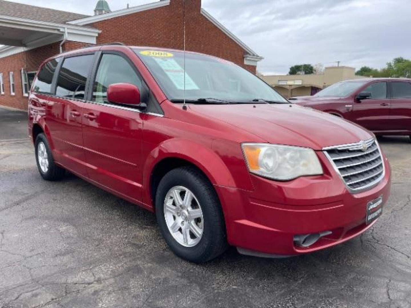 2008 Inferno Red Crystal Pearl Chrysler Town and Country Touring (2A8HR54P38R) with an 3.8L V6 OHV 12V engine, 6-Speed Automatic transmission, located at 1865 W 2nd St., Xenia, OH, 45385, (937) 372-7777, 39.681259, -83.961945 - Photo#0