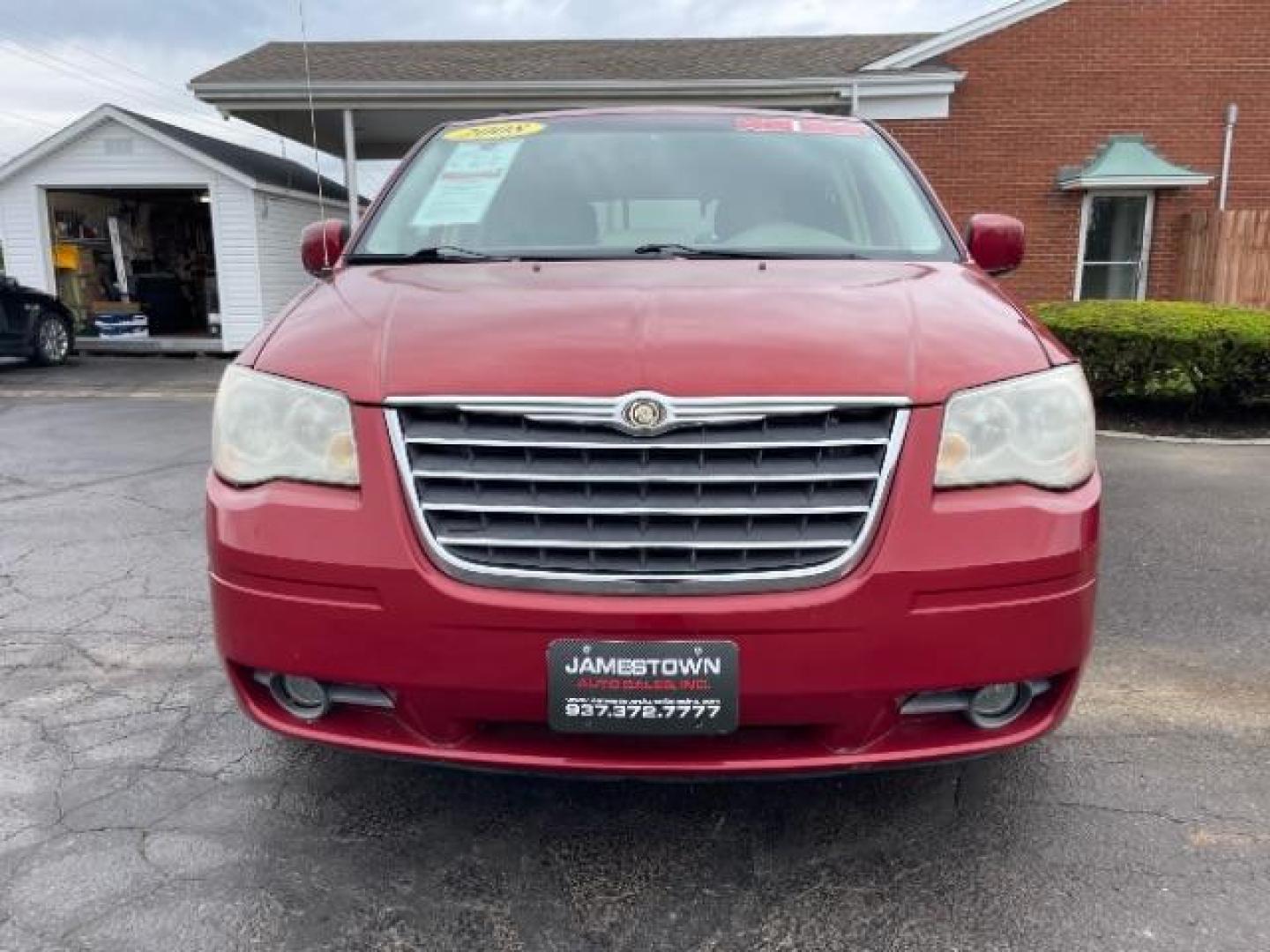 2008 Inferno Red Crystal Pearl Chrysler Town and Country Touring (2A8HR54P38R) with an 3.8L V6 OHV 12V engine, 6-Speed Automatic transmission, located at 1865 W 2nd St., Xenia, OH, 45385, (937) 372-7777, 39.681259, -83.961945 - Photo#4