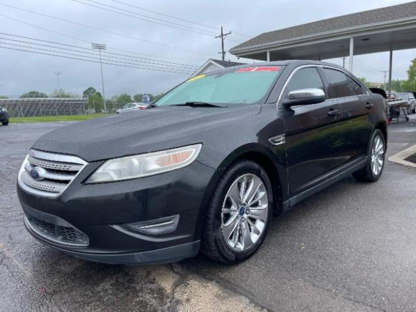 2010 Tuxedo Black Metallic Ford Taurus Limited AWD (1FAHP2JW6AG) with an 3.5L V6 DOHC 24V engine, 6-Speed Automatic transmission, located at 1865 W 2nd St., Xenia, OH, 45385, (937) 372-7777, 39.681259, -83.961945 - Photo#1