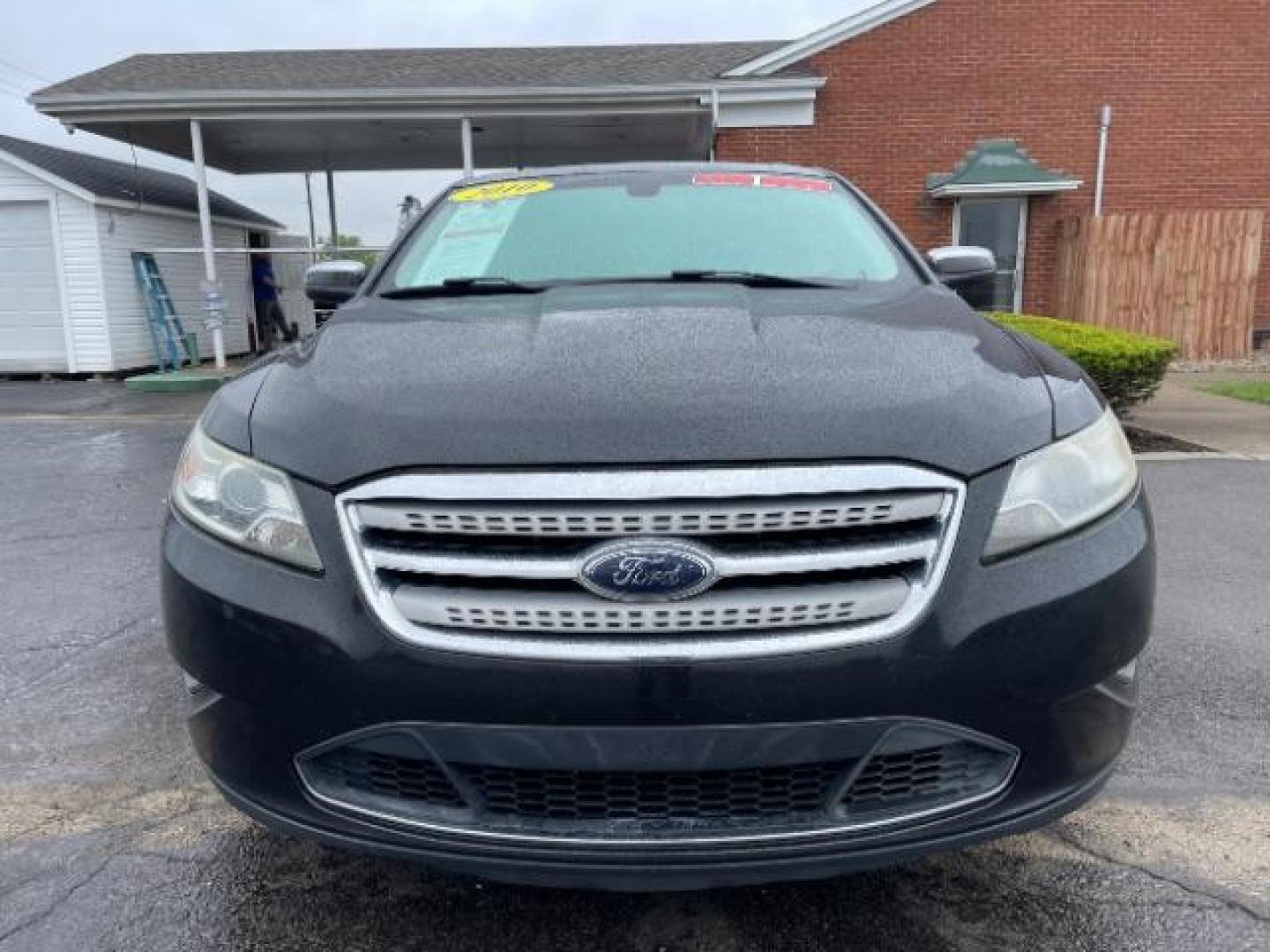 2010 Tuxedo Black Metallic Ford Taurus Limited AWD (1FAHP2JW6AG) with an 3.5L V6 DOHC 24V engine, 6-Speed Automatic transmission, located at 1865 W 2nd St., Xenia, OH, 45385, (937) 372-7777, 39.681259, -83.961945 - Photo#4