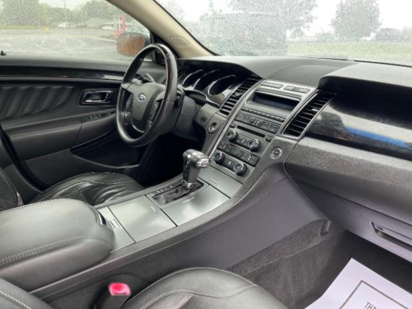 2010 Tuxedo Black Metallic Ford Taurus Limited AWD (1FAHP2JW6AG) with an 3.5L V6 DOHC 24V engine, 6-Speed Automatic transmission, located at 1865 W 2nd St., Xenia, OH, 45385, (937) 372-7777, 39.681259, -83.961945 - Photo#8