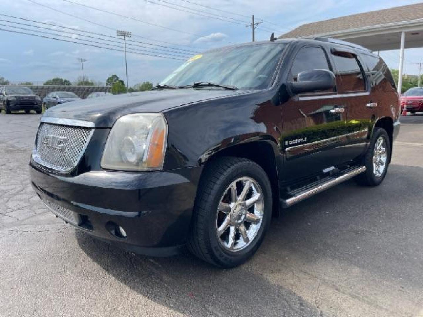 2007 Onyx Black GMC Yukon Denali AWD (1GKFK63807J) with an 6.2L V8 OHV 16V engine, 4-Speed Automatic transmission, located at 1865 W 2nd St., Xenia, OH, 45385, (937) 372-7777, 39.681259, -83.961945 - Photo#1