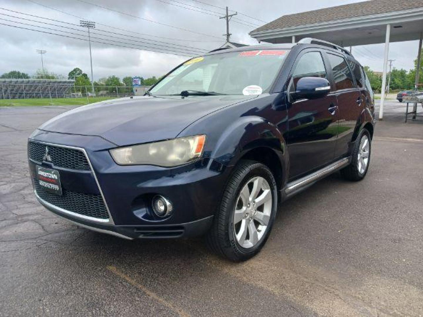 2010 Labrador Black Mitsubishi Outlander SE 4WD (JA4JT4AX1AZ) with an 3.0L V6 SOHC 24V engine, Continuously Variable Transmission transmission, located at 1865 W 2nd St., Xenia, OH, 45385, (937) 372-7777, 39.681259, -83.961945 - Third Row - Photo#1