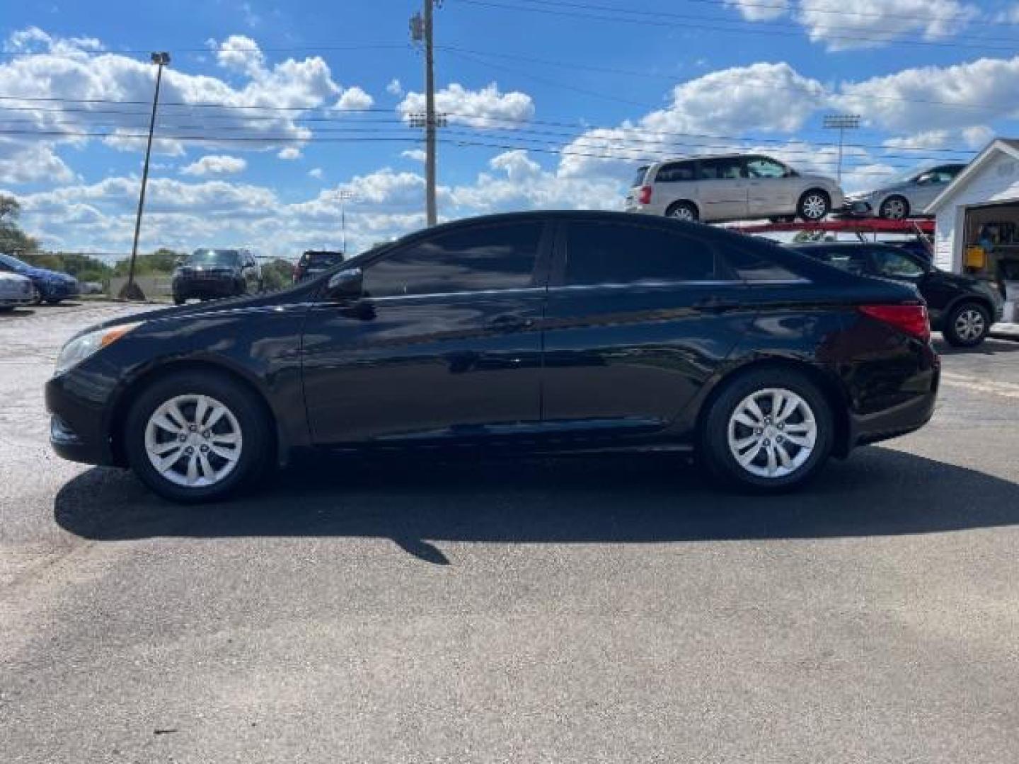 2012 Midnight Black Hyundai Sonata GLS Auto (5NPEB4AC9CH) with an 2.4L L4 DOHC 16V engine, 6-Speed Automatic transmission, located at 1865 W 2nd St., Xenia, OH, 45385, (937) 372-7777, 39.681259, -83.961945 - Photo#2