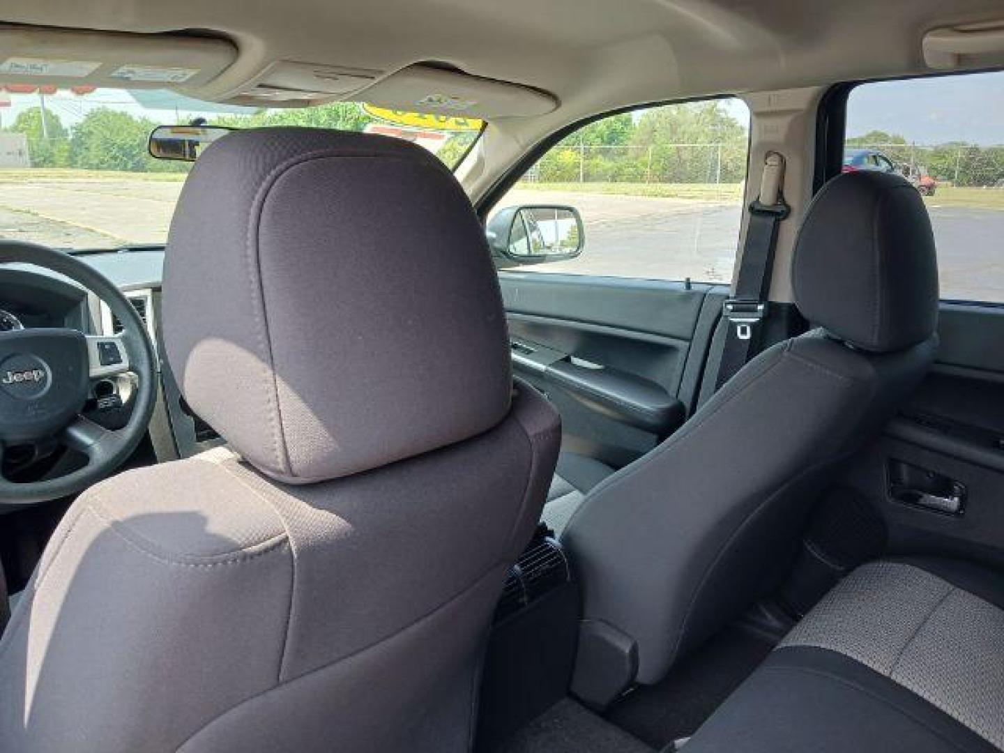 2010 Stone White Jeep Grand Cherokee Laredo 4WD (1J4PR4GK8AC) with an 3.7L V6 SOHC 12V engine, 5-Speed Automatic transmission, located at 1865 W 2nd St., Xenia, OH, 45385, (937) 372-7777, 39.681259, -83.961945 - Photo#9