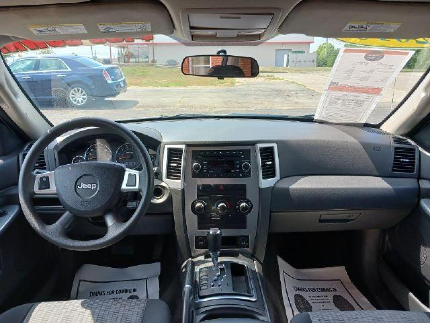 2010 Stone White Jeep Grand Cherokee Laredo 4WD (1J4PR4GK8AC) with an 3.7L V6 SOHC 12V engine, 5-Speed Automatic transmission, located at 1865 W 2nd St., Xenia, OH, 45385, (937) 372-7777, 39.681259, -83.961945 - Photo#7