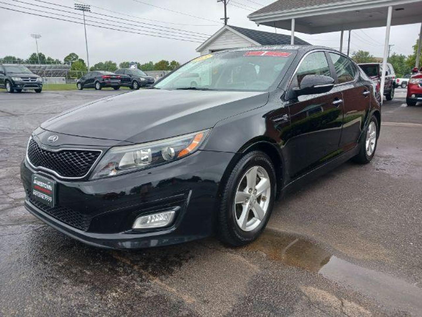 2015 Ebony Black Kia Optima LX (5XXGM4A77FG) with an 2.4L L4 DOHC 16V engine, 6-Speed Automatic transmission, located at 1865 W 2nd St., Xenia, OH, 45385, (937) 372-7777, 39.681259, -83.961945 - Photo#1