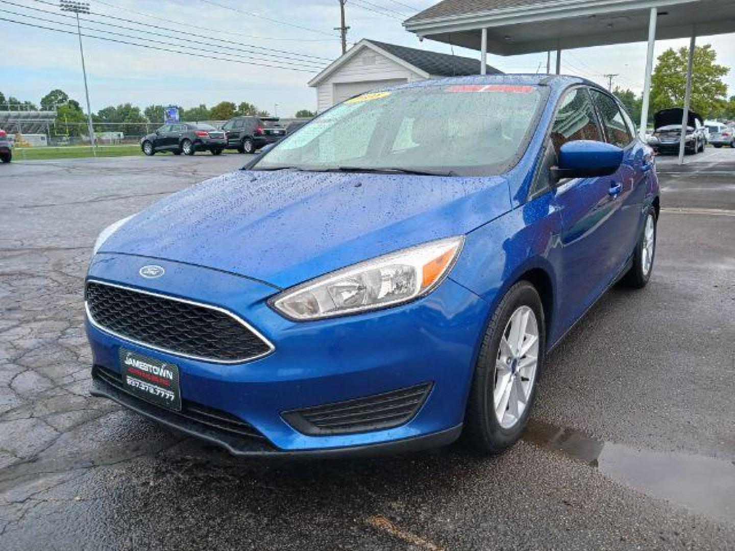 2018 Lightning Blue Metallic Ford Focus SE Hatch (1FADP3K29JL) with an 2.0L L4 DOHC 16V engine, located at 1865 W 2nd St., Xenia, OH, 45385, (937) 372-7777, 39.681259, -83.961945 - Photo#1