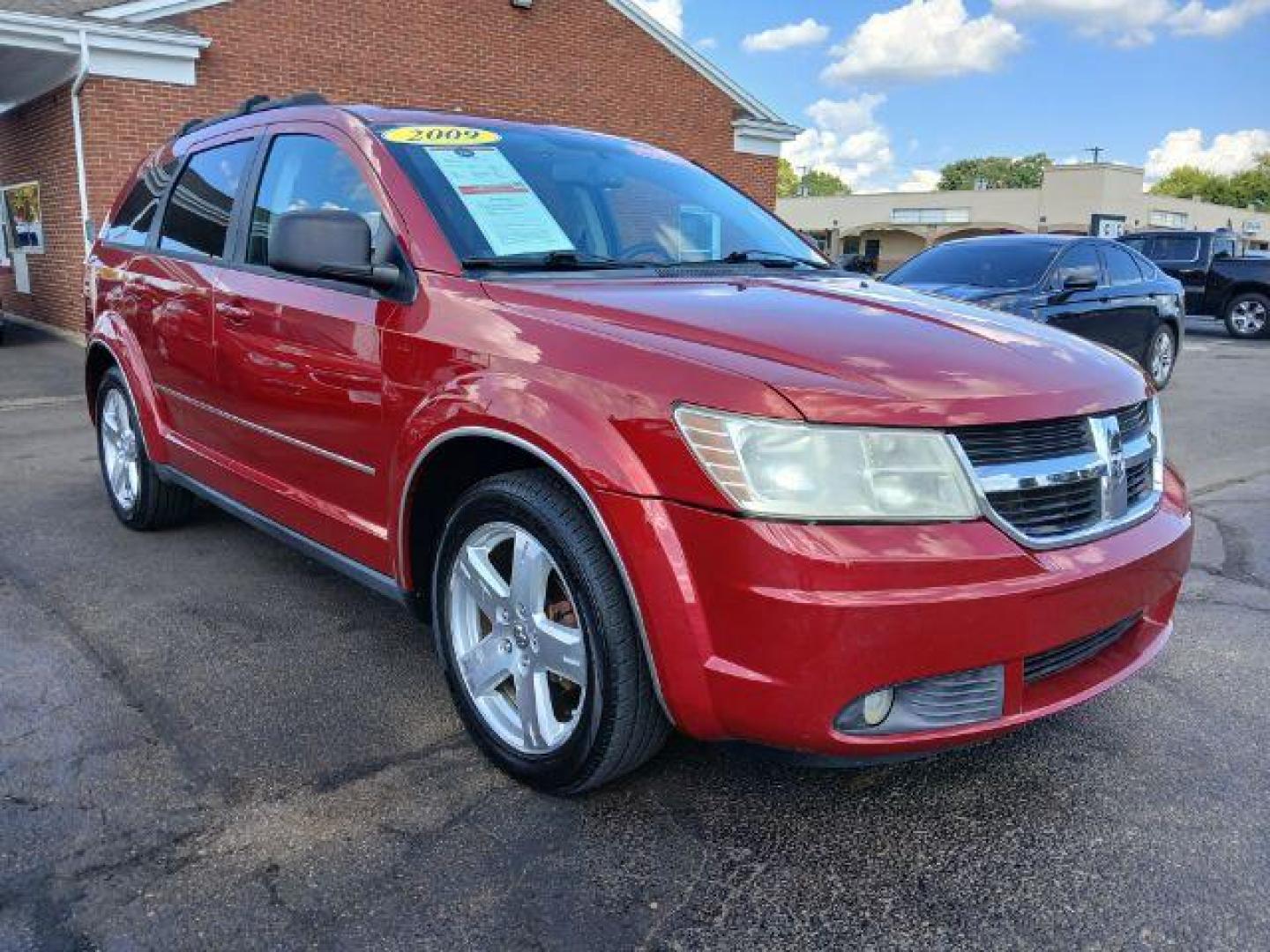 2009 Inferno Red Crystal Dodge Journey SXT (3D4GG57V79T) with an 3.5L V6 SOHC 24V engine, 6-Speed Automatic transmission, located at 1865 W 2nd St., Xenia, OH, 45385, (937) 372-7777, 39.681259, -83.961945 - Photo#0