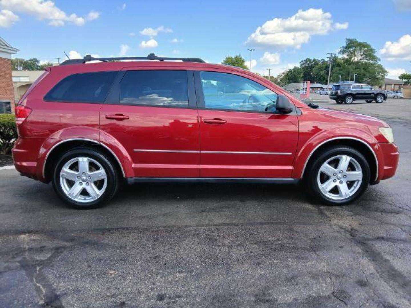 2009 Inferno Red Crystal Dodge Journey SXT (3D4GG57V79T) with an 3.5L V6 SOHC 24V engine, 6-Speed Automatic transmission, located at 1865 W 2nd St., Xenia, OH, 45385, (937) 372-7777, 39.681259, -83.961945 - Photo#3