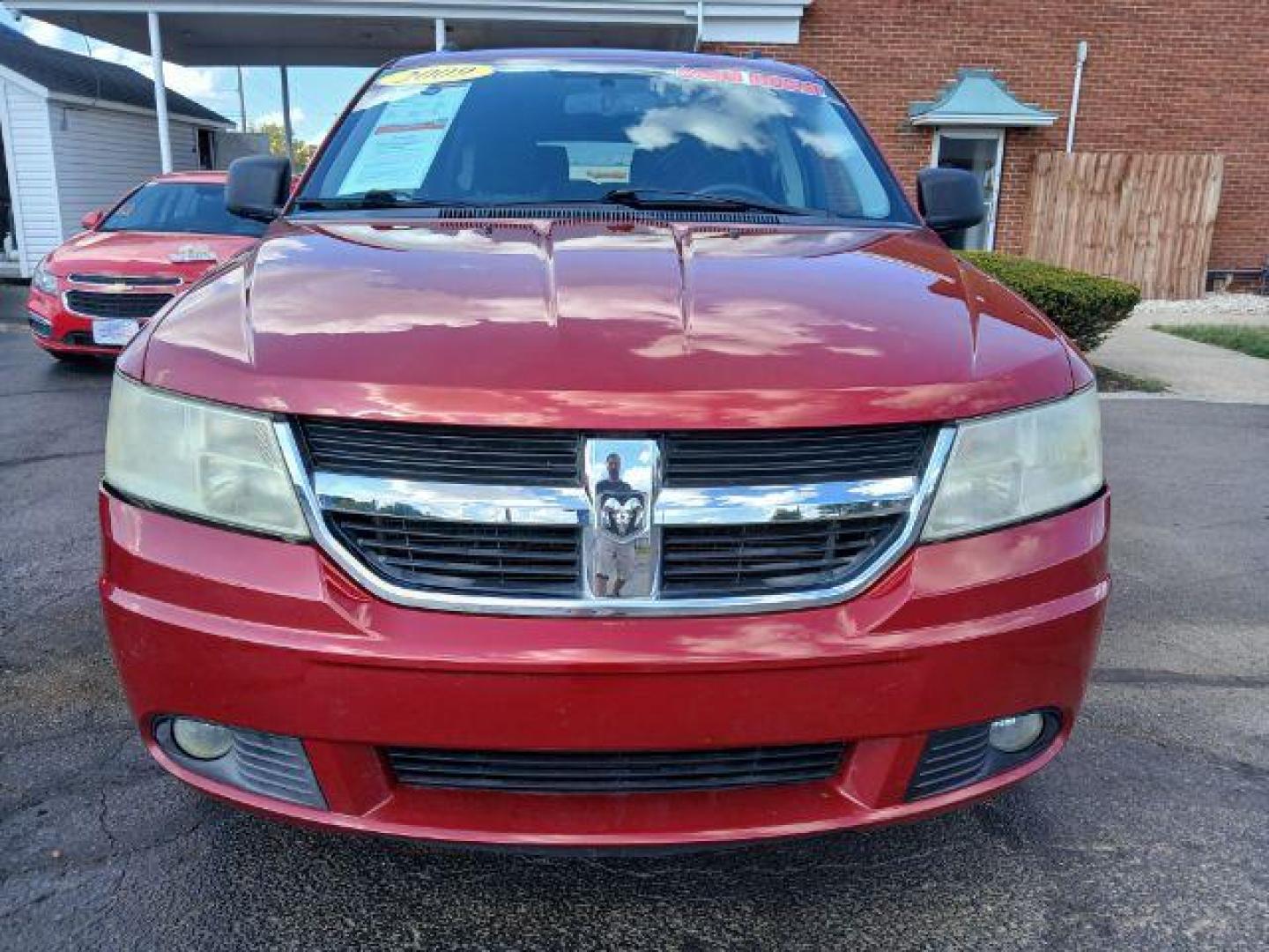 2009 Inferno Red Crystal Dodge Journey SXT (3D4GG57V79T) with an 3.5L V6 SOHC 24V engine, 6-Speed Automatic transmission, located at 1865 W 2nd St., Xenia, OH, 45385, (937) 372-7777, 39.681259, -83.961945 - Photo#4