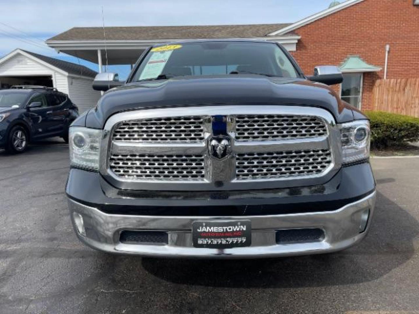 2013 Black RAM 1500 Laramie Quad Cab 4WD (1C6RR7JT5DS) with an 5.7L V8 OHV 16V engine, 6-Speed Automatic transmission, located at 1865 W 2nd St., Xenia, OH, 45385, (937) 372-7777, 39.681259, -83.961945 - Photo#2