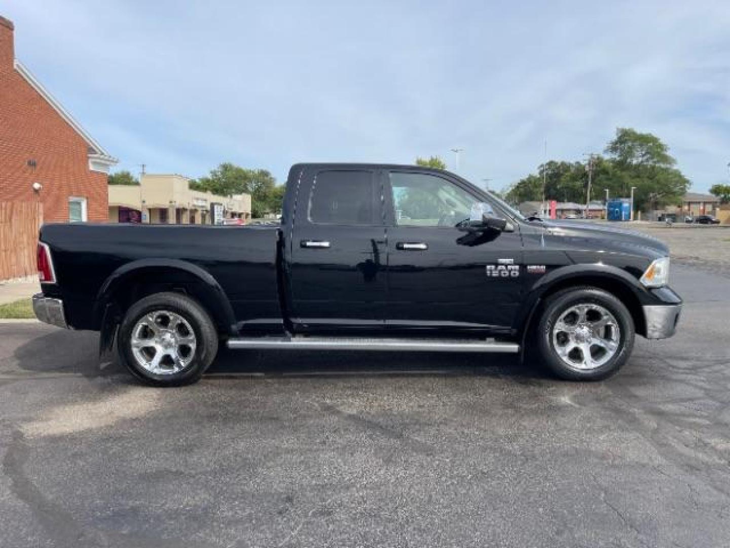 2013 Black RAM 1500 Laramie Quad Cab 4WD (1C6RR7JT5DS) with an 5.7L V8 OHV 16V engine, 6-Speed Automatic transmission, located at 1865 W 2nd St., Xenia, OH, 45385, (937) 372-7777, 39.681259, -83.961945 - Photo#5