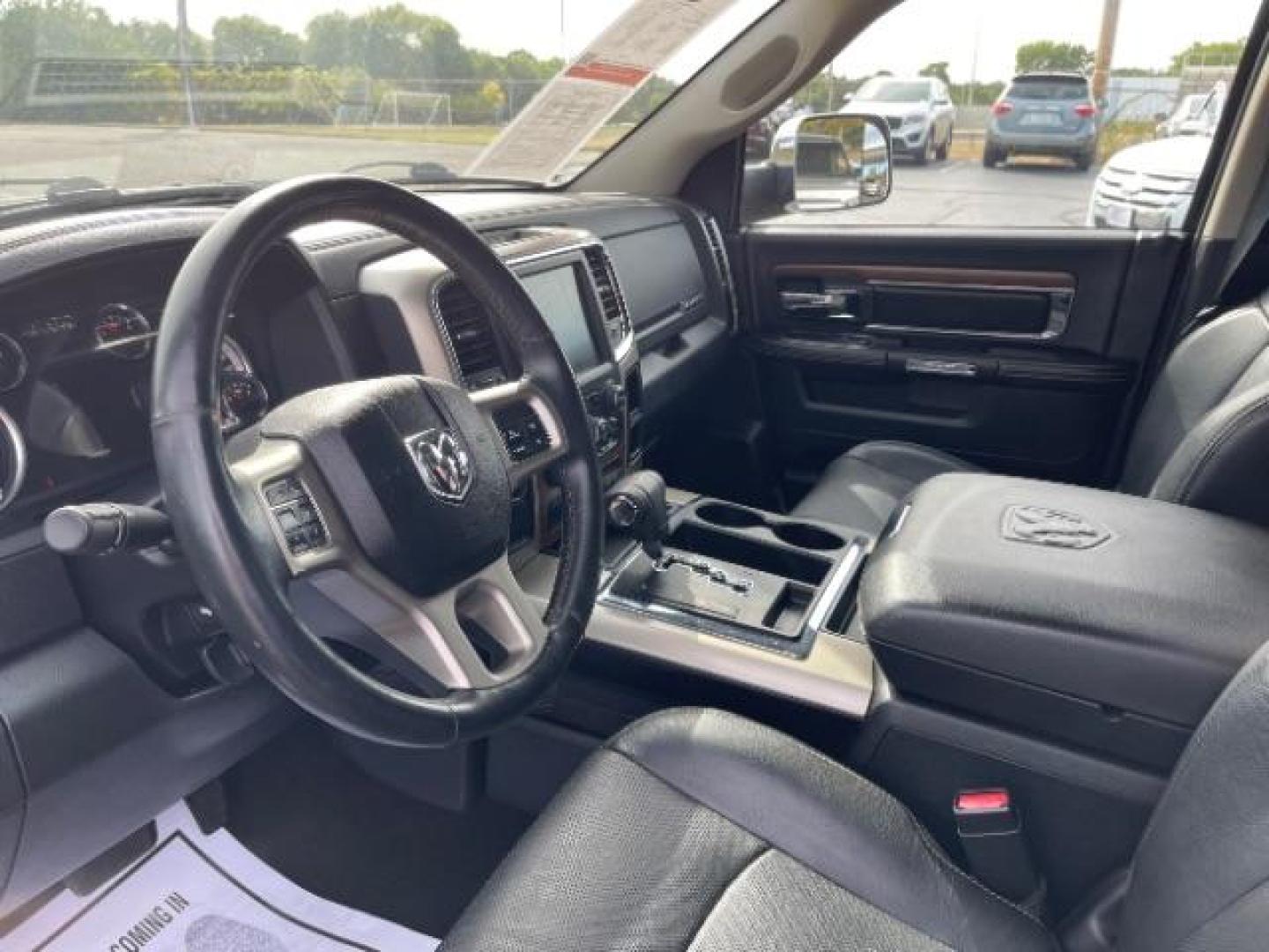 2013 Black RAM 1500 Laramie Quad Cab 4WD (1C6RR7JT5DS) with an 5.7L V8 OHV 16V engine, 6-Speed Automatic transmission, located at 1865 W 2nd St., Xenia, OH, 45385, (937) 372-7777, 39.681259, -83.961945 - Photo#6