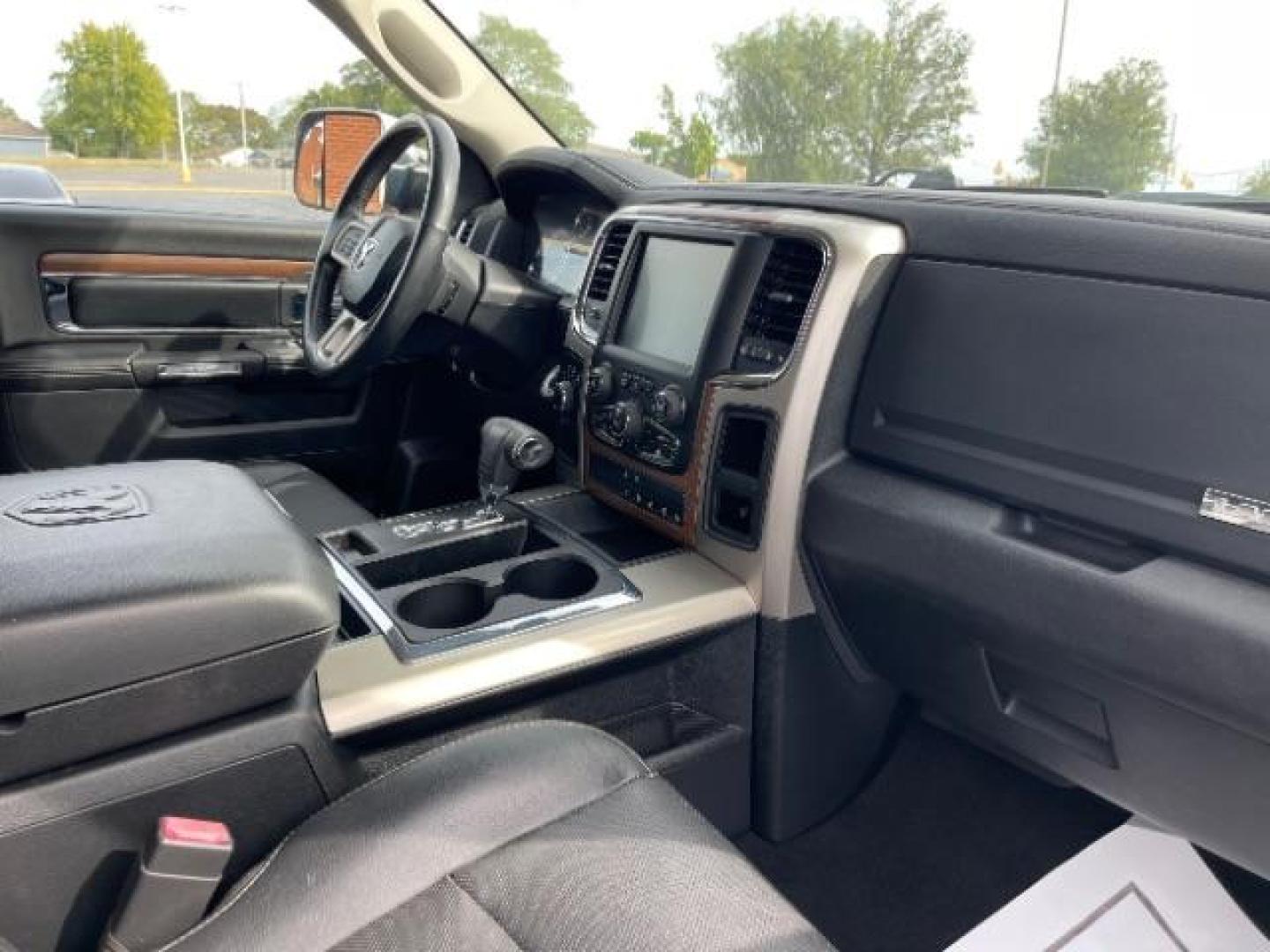 2013 Black RAM 1500 Laramie Quad Cab 4WD (1C6RR7JT5DS) with an 5.7L V8 OHV 16V engine, 6-Speed Automatic transmission, located at 1865 W 2nd St., Xenia, OH, 45385, (937) 372-7777, 39.681259, -83.961945 - Photo#7