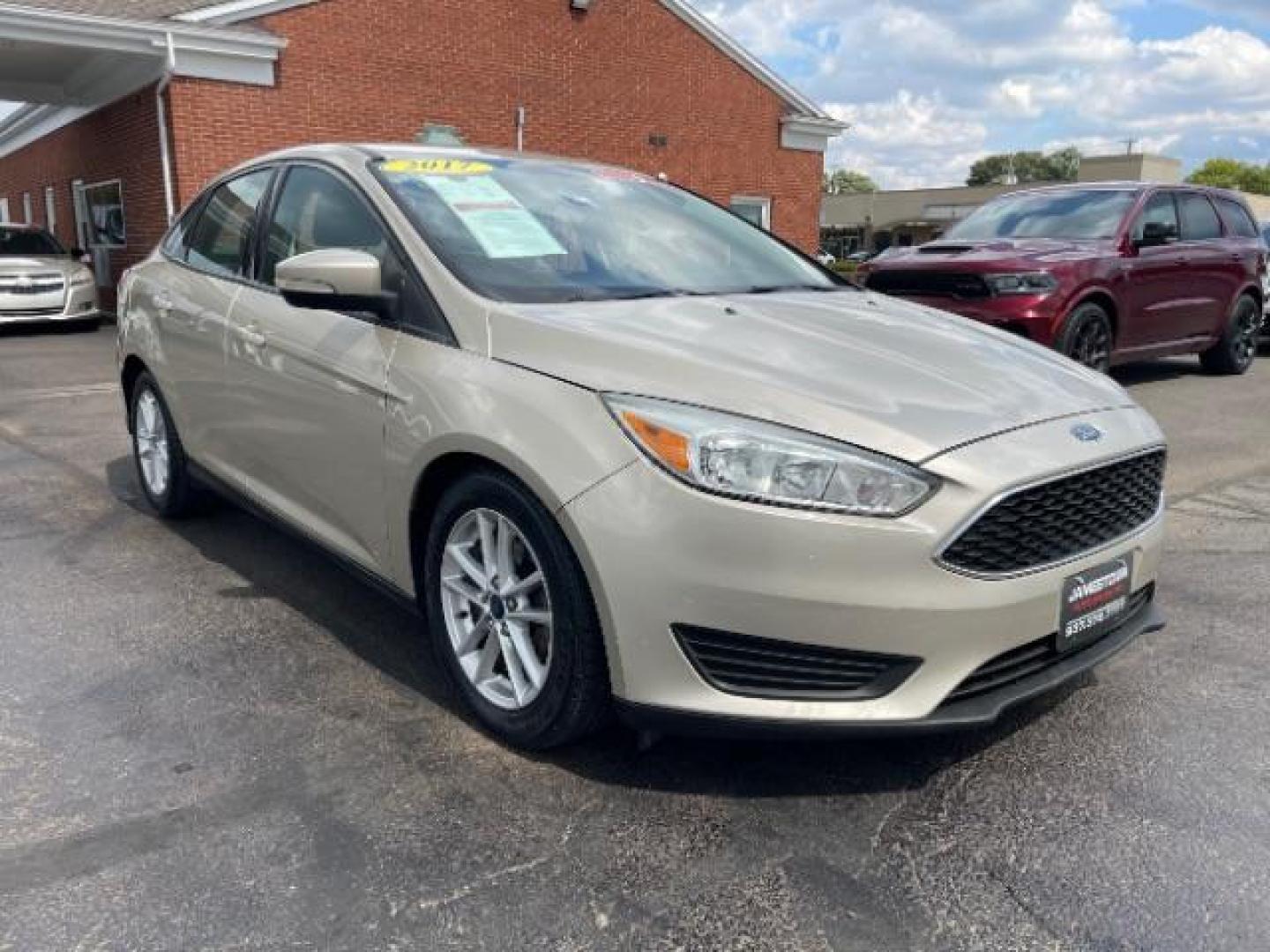 2017 White Gold Ford Focus SE Sedan (1FADP3F21HL) with an 2.0L L4 DOHC 16V engine, located at 1865 W 2nd St., Xenia, OH, 45385, (937) 372-7777, 39.681259, -83.961945 - Photo#0