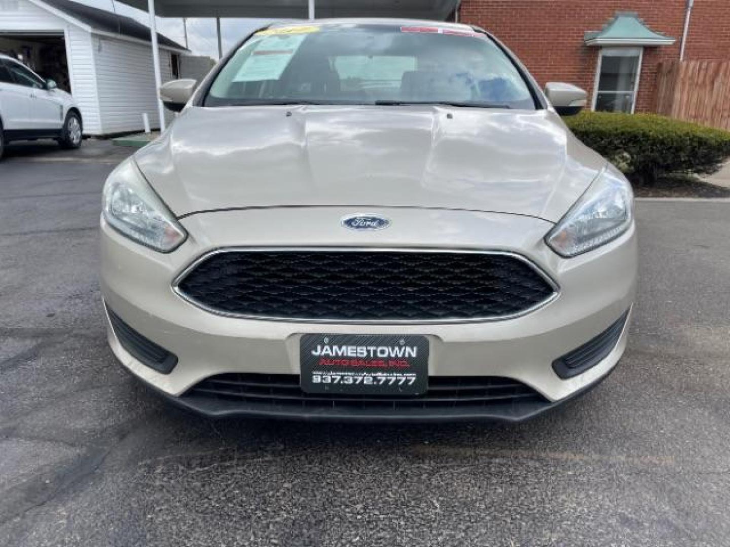 2017 White Gold Ford Focus SE Sedan (1FADP3F21HL) with an 2.0L L4 DOHC 16V engine, located at 1865 W 2nd St., Xenia, OH, 45385, (937) 372-7777, 39.681259, -83.961945 - Photo#2