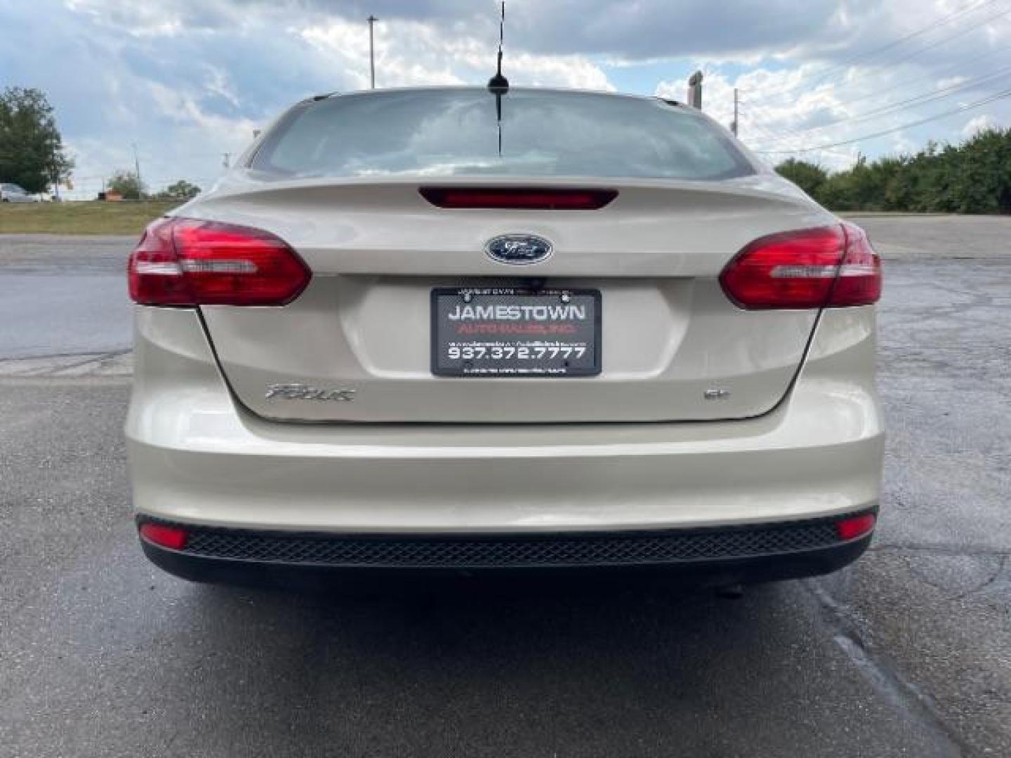 2017 White Gold Ford Focus SE Sedan (1FADP3F21HL) with an 2.0L L4 DOHC 16V engine, located at 1865 W 2nd St., Xenia, OH, 45385, (937) 372-7777, 39.681259, -83.961945 - Photo#3