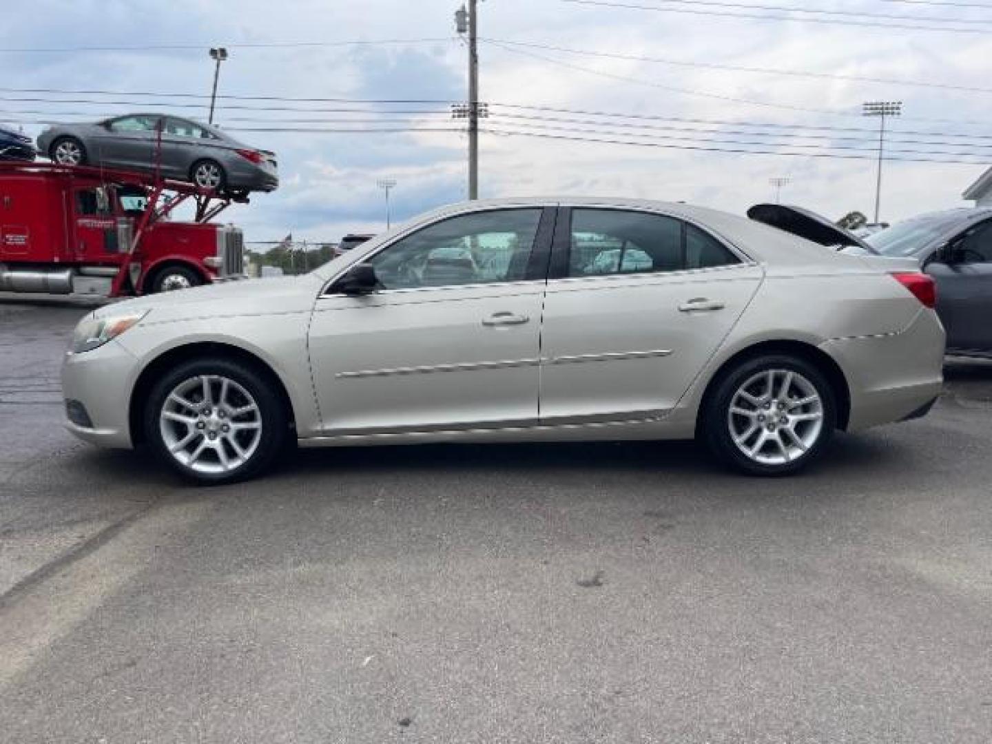 2013 Champagne Silver Metallic Chevrolet Malibu LS (1G11B5SA9DF) with an 2.5L L4 DOHC 16V engine, 6-Speed Automatic transmission, located at 1865 W 2nd St., Xenia, OH, 45385, (937) 372-7777, 39.681259, -83.961945 - Photo#4