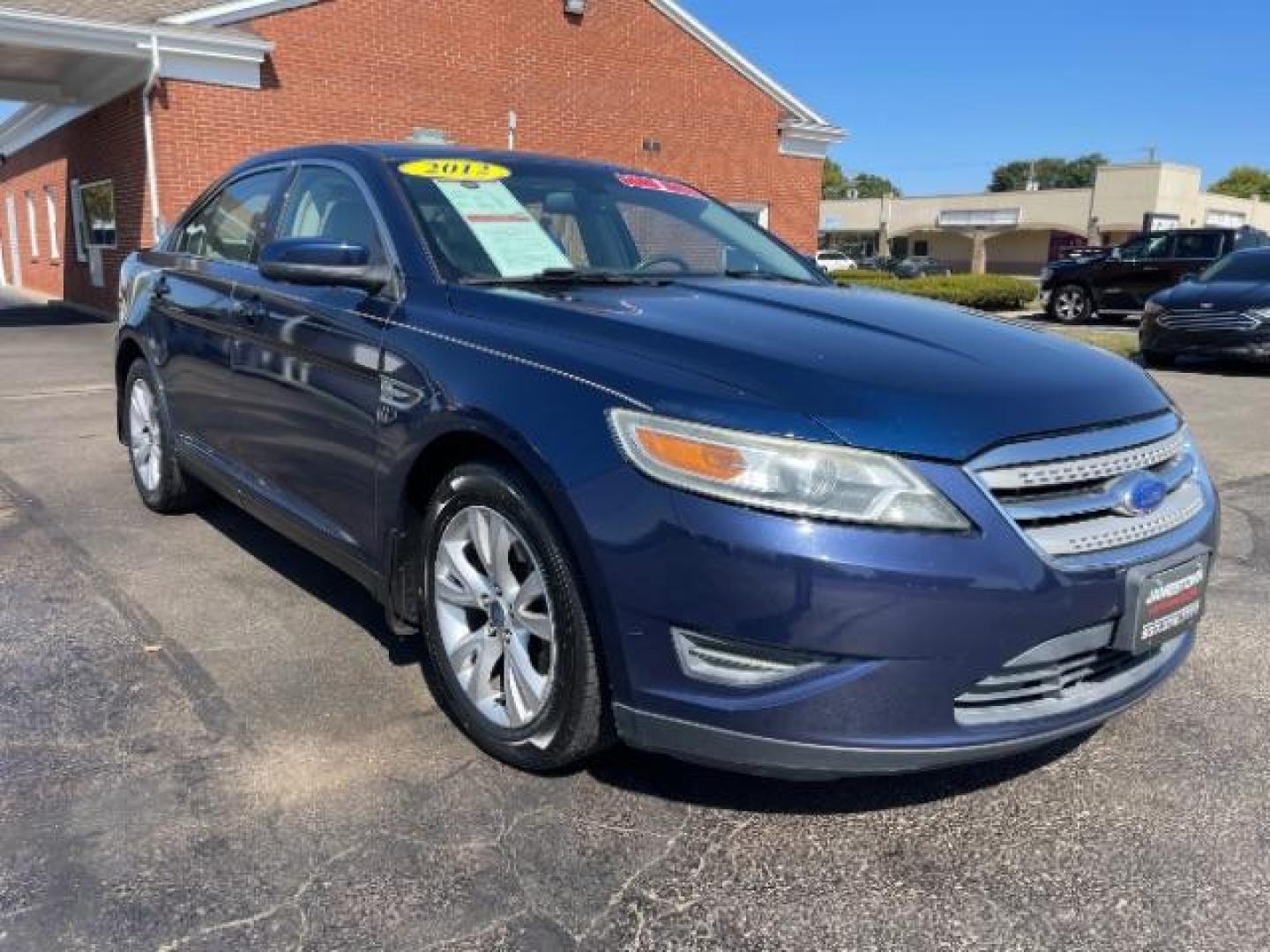 2012 Dark Blue Pearl Ford Taurus SEL FWD (1FAHP2EW4CG) with an 3.5L V6 DOHC 24V engine, 6-Speed Automatic transmission, located at 1865 W 2nd St., Xenia, OH, 45385, (937) 372-7777, 39.681259, -83.961945 - Photo#0