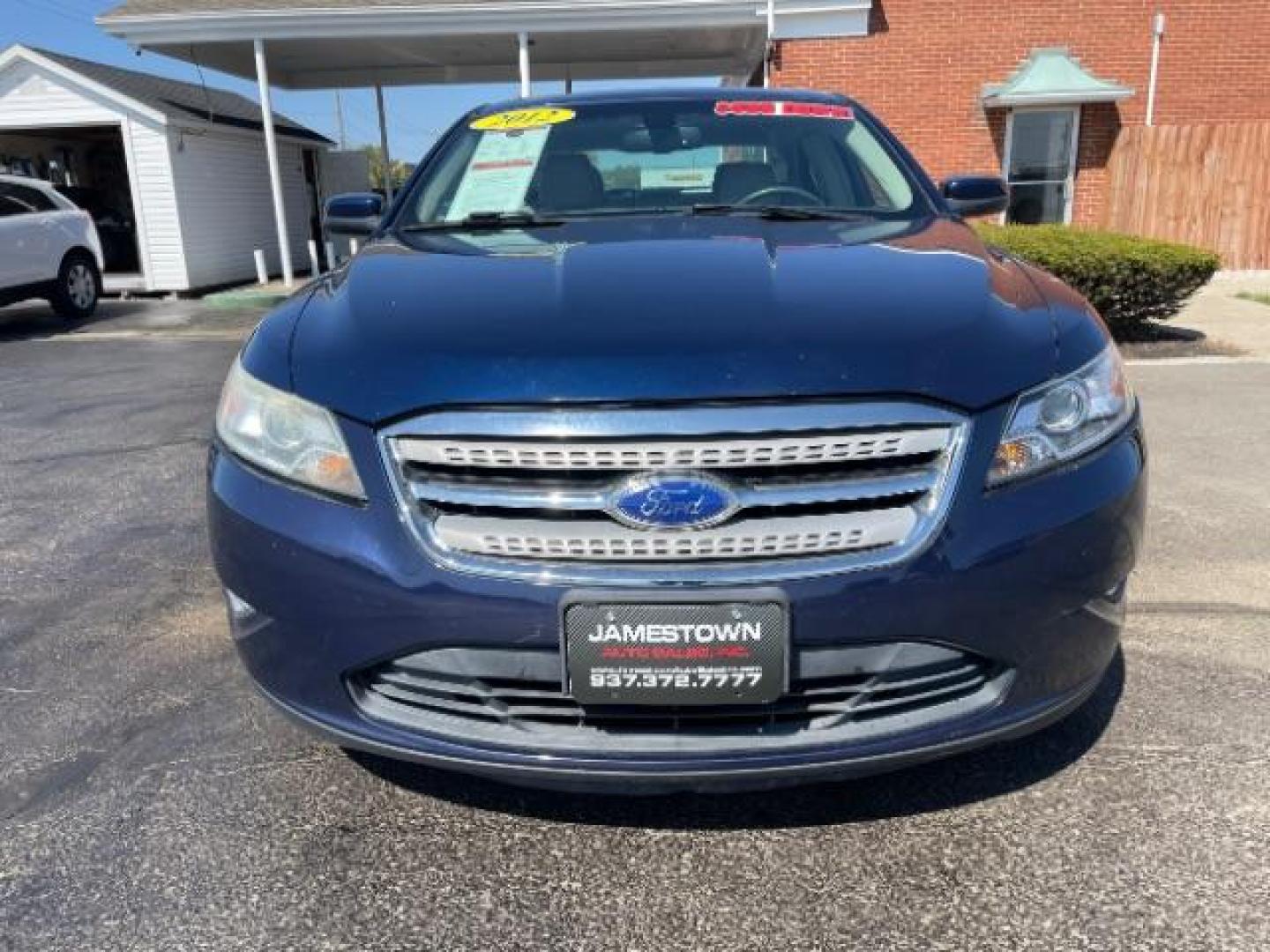 2012 Dark Blue Pearl Ford Taurus SEL FWD (1FAHP2EW4CG) with an 3.5L V6 DOHC 24V engine, 6-Speed Automatic transmission, located at 1865 W 2nd St., Xenia, OH, 45385, (937) 372-7777, 39.681259, -83.961945 - Photo#4