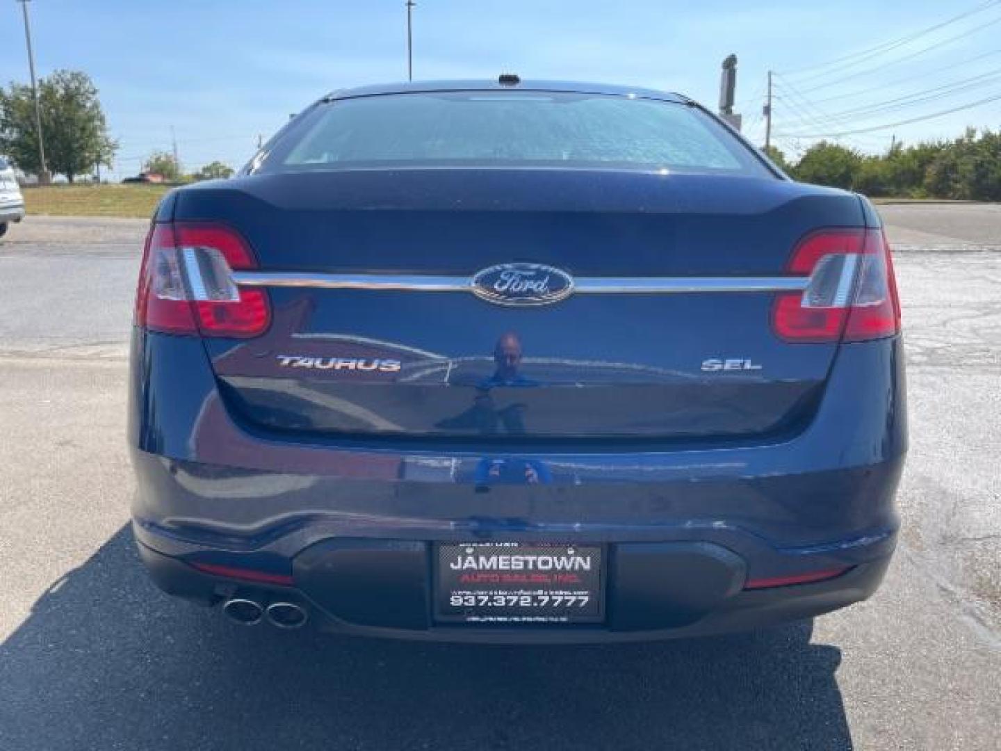 2012 Dark Blue Pearl Ford Taurus SEL FWD (1FAHP2EW4CG) with an 3.5L V6 DOHC 24V engine, 6-Speed Automatic transmission, located at 1865 W 2nd St., Xenia, OH, 45385, (937) 372-7777, 39.681259, -83.961945 - Photo#5