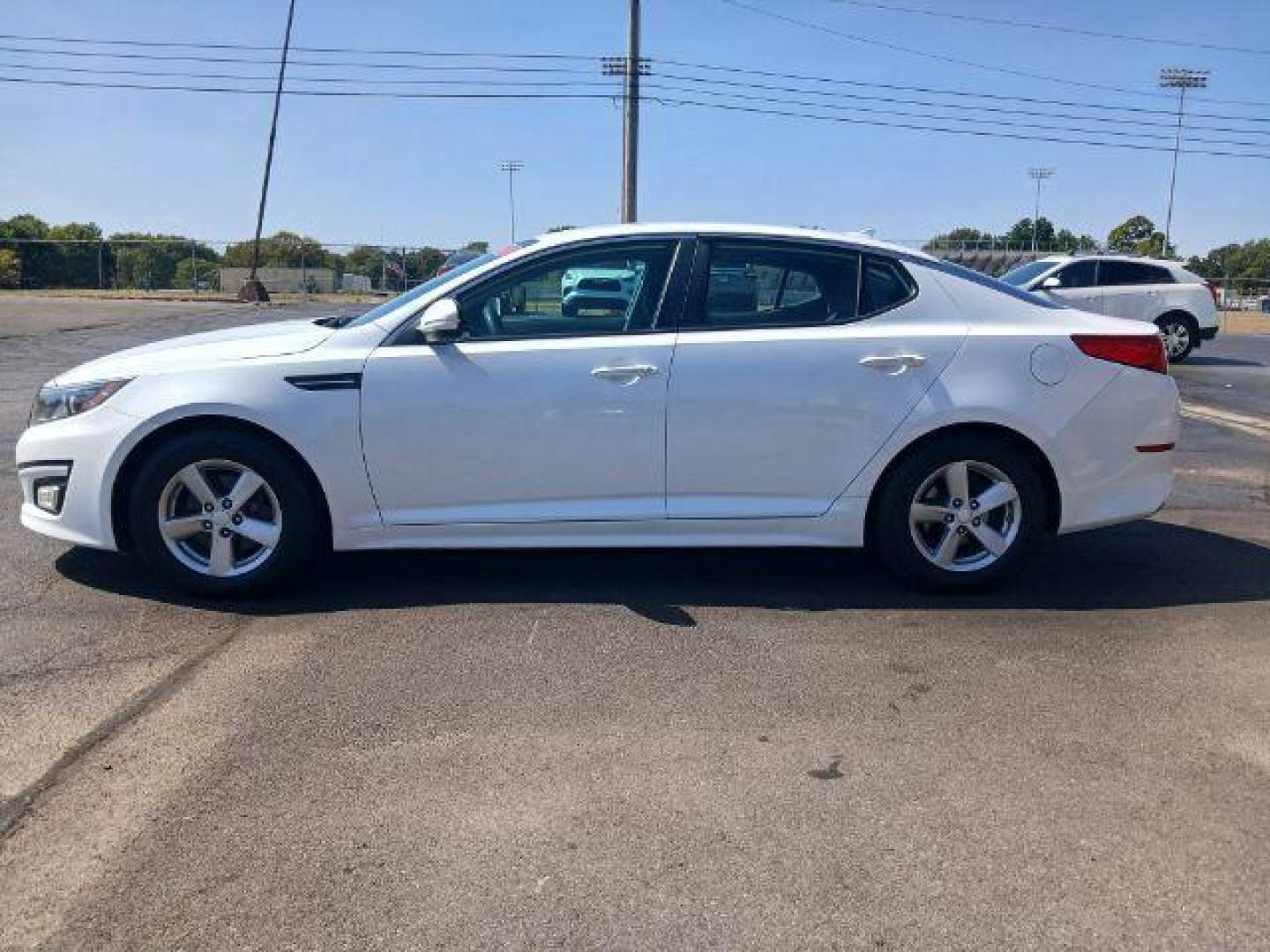 2015 Snow White Pearl Kia Optima LX (5XXGM4A77FG) with an 2.4L L4 DOHC 16V engine, 6-Speed Automatic transmission, located at 1865 W 2nd St., Xenia, OH, 45385, (937) 372-7777, 39.681259, -83.961945 - Photo#2