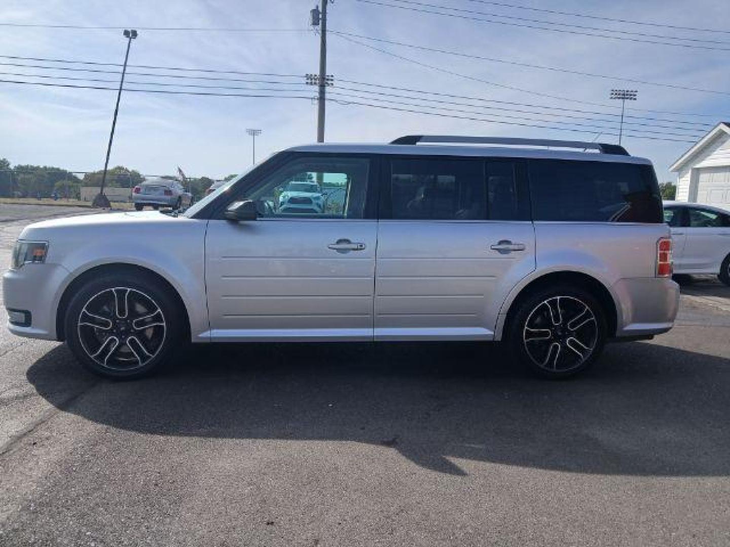 2014 Ingot Silver Metallic Ford Flex SEL FWD (2FMGK5C88EB) with an 3.5L V6 DOHC 24V engine, 6-Speed Automatic Overdrive transmission, located at 1865 W 2nd St., Xenia, OH, 45385, (937) 372-7777, 39.681259, -83.961945 - Third Row - Photo#2