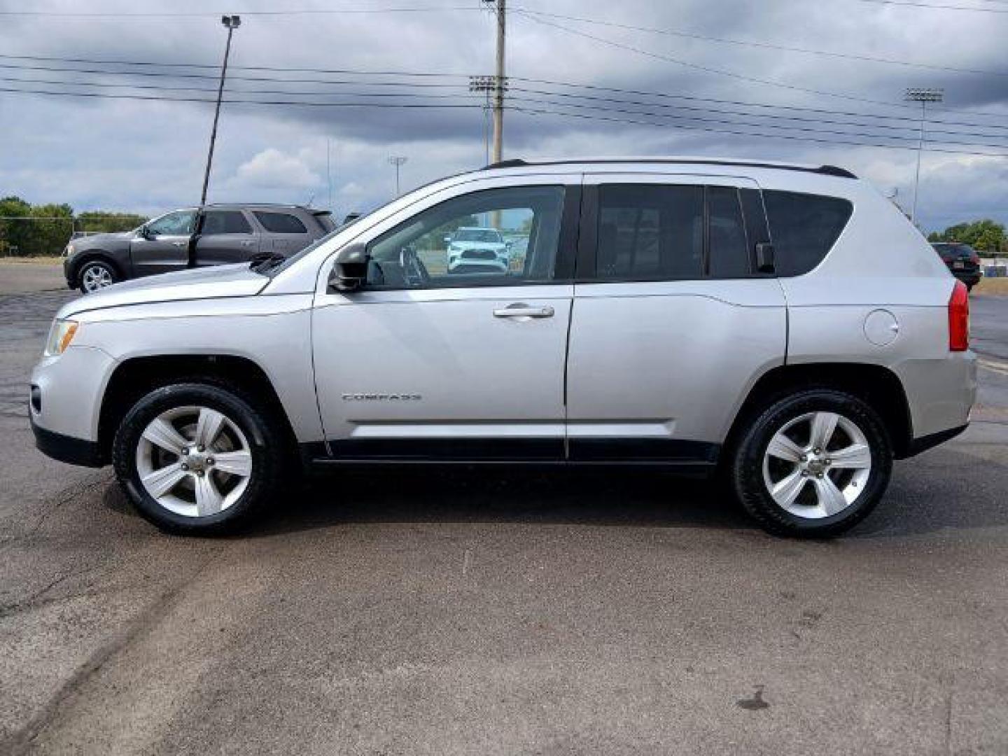 2011 Silver Jeep Compass Sport 4WD (1J4NF1FB8BD) with an 2.4L L4 DOHC 16V engine, located at 1865 W 2nd St., Xenia, OH, 45385, (937) 372-7777, 39.681259, -83.961945 - Photo#2