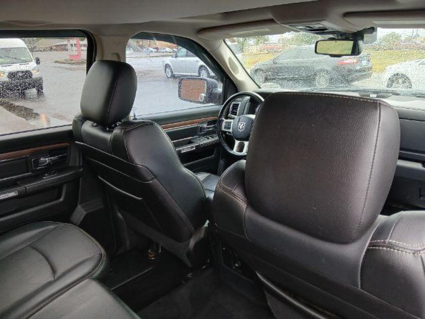 2014 Black Clearcoat RAM 1500 Laramie Crew Cab LWB 4WD (1C6RR7VT5ES) with an 5.7L V8 OHV 16V engine, 8-Speed Automatic transmission, located at 1865 W 2nd St., Xenia, OH, 45385, (937) 372-7777, 39.681259, -83.961945 - Photo#10