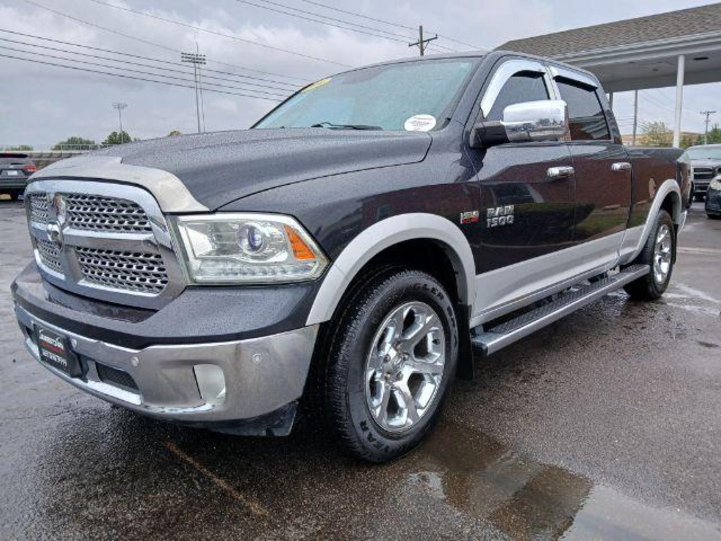 2014 Black Clearcoat RAM 1500 Laramie Crew Cab LWB 4WD (1C6RR7VT5ES) with an 5.7L V8 OHV 16V engine, 8-Speed Automatic transmission, located at 1865 W 2nd St., Xenia, OH, 45385, (937) 372-7777, 39.681259, -83.961945 - Photo#1