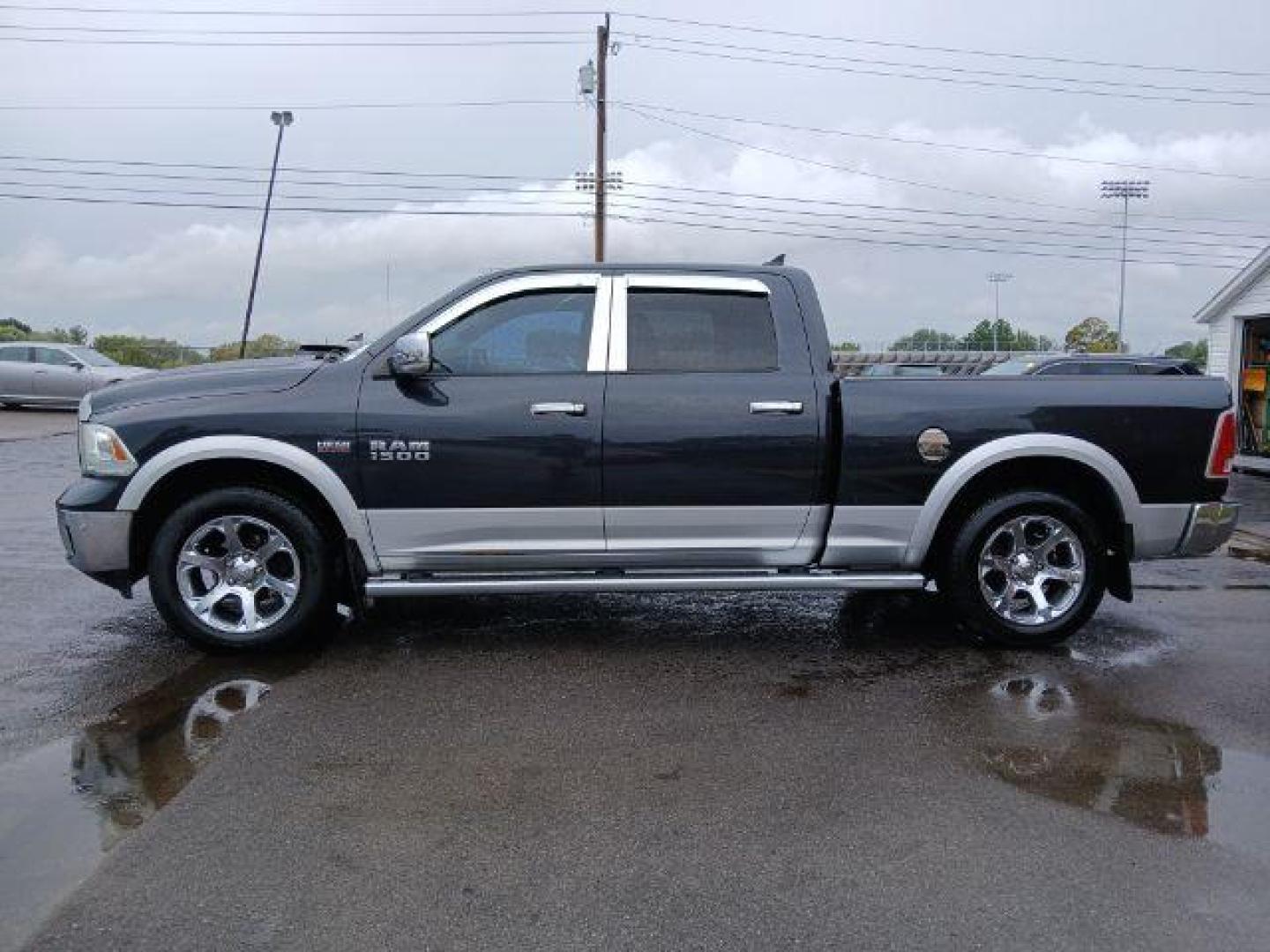 2014 Black Clearcoat RAM 1500 Laramie Crew Cab LWB 4WD (1C6RR7VT5ES) with an 5.7L V8 OHV 16V engine, 8-Speed Automatic transmission, located at 1865 W 2nd St., Xenia, OH, 45385, (937) 372-7777, 39.681259, -83.961945 - Photo#2