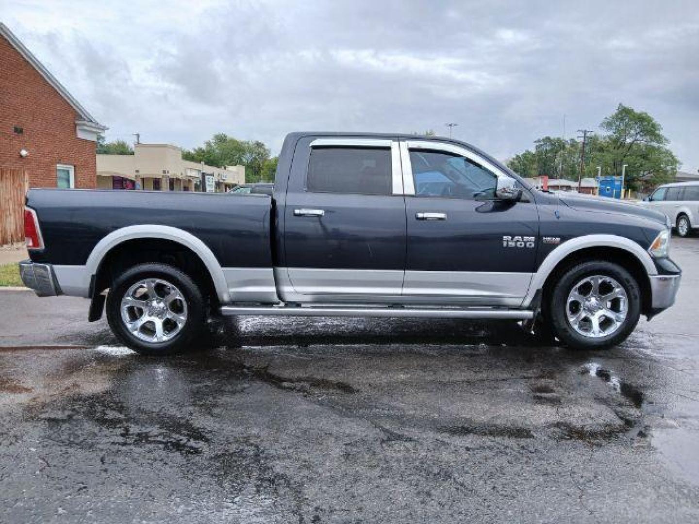 2014 Black Clearcoat RAM 1500 Laramie Crew Cab LWB 4WD (1C6RR7VT5ES) with an 5.7L V8 OHV 16V engine, 8-Speed Automatic transmission, located at 1865 W 2nd St., Xenia, OH, 45385, (937) 372-7777, 39.681259, -83.961945 - Photo#3