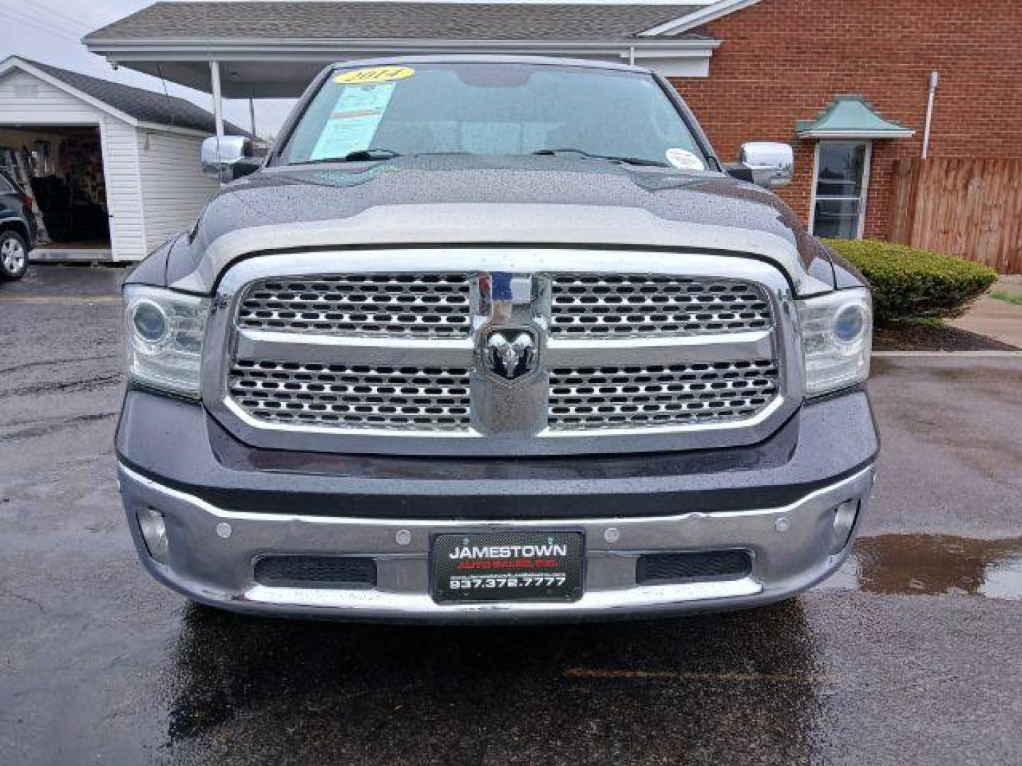 2014 Black Clearcoat RAM 1500 Laramie Crew Cab LWB 4WD (1C6RR7VT5ES) with an 5.7L V8 OHV 16V engine, 8-Speed Automatic transmission, located at 1865 W 2nd St., Xenia, OH, 45385, (937) 372-7777, 39.681259, -83.961945 - Photo#4