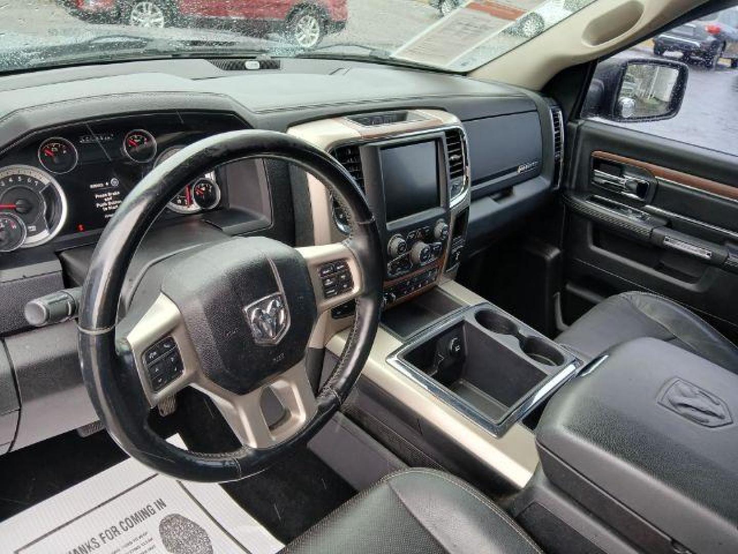 2014 Black Clearcoat RAM 1500 Laramie Crew Cab LWB 4WD (1C6RR7VT5ES) with an 5.7L V8 OHV 16V engine, 8-Speed Automatic transmission, located at 1865 W 2nd St., Xenia, OH, 45385, (937) 372-7777, 39.681259, -83.961945 - Photo#6