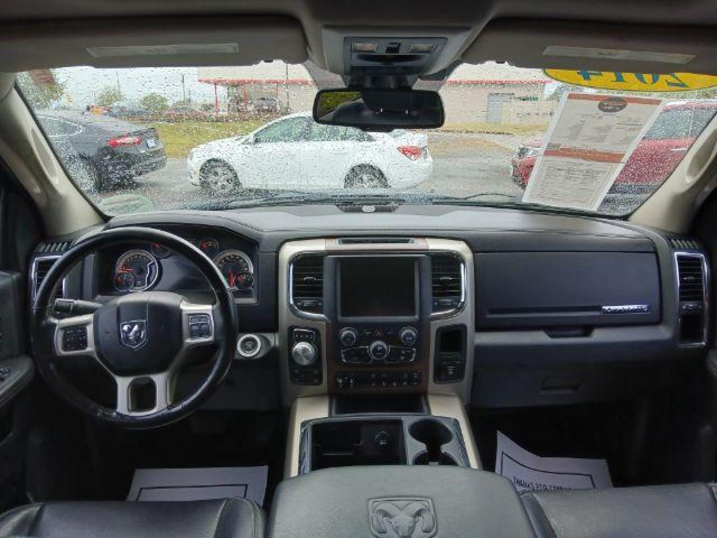 2014 Black Clearcoat RAM 1500 Laramie Crew Cab LWB 4WD (1C6RR7VT5ES) with an 5.7L V8 OHV 16V engine, 8-Speed Automatic transmission, located at 1865 W 2nd St., Xenia, OH, 45385, (937) 372-7777, 39.681259, -83.961945 - Photo#7