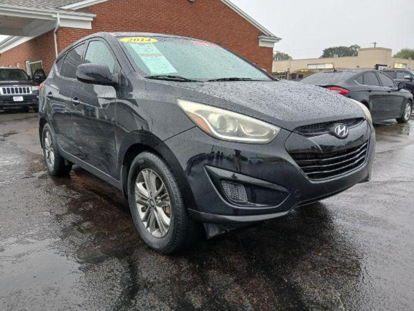 2014 Black Hyundai Tucson GL Auto AWD (KM8JTCAF0EU) with an 2.0L L4 DOHC 16V engine, 6-Speed Automatic transmission, located at 1865 W 2nd St., Xenia, OH, 45385, (937) 372-7777, 39.681259, -83.961945 - Photo#0