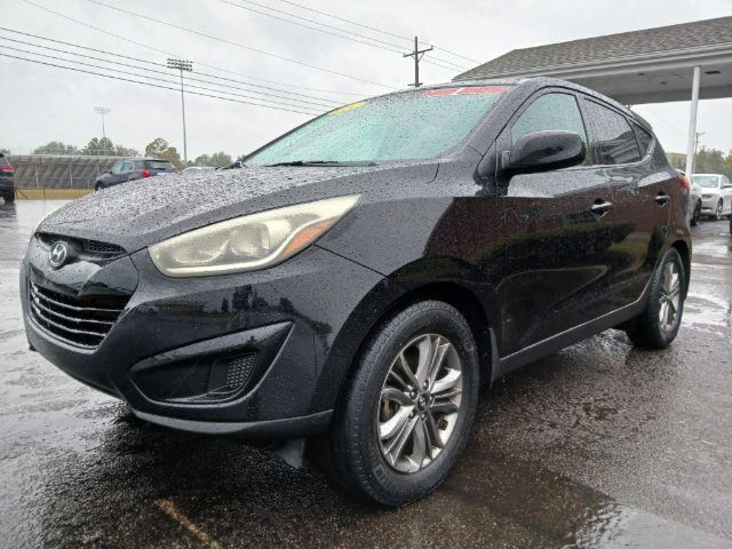 2014 Black Hyundai Tucson GL Auto AWD (KM8JTCAF0EU) with an 2.0L L4 DOHC 16V engine, 6-Speed Automatic transmission, located at 1865 W 2nd St., Xenia, OH, 45385, (937) 372-7777, 39.681259, -83.961945 - Photo#1