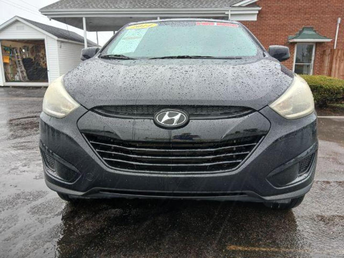 2014 Black Hyundai Tucson GL Auto AWD (KM8JTCAF0EU) with an 2.0L L4 DOHC 16V engine, 6-Speed Automatic transmission, located at 1865 W 2nd St., Xenia, OH, 45385, (937) 372-7777, 39.681259, -83.961945 - Photo#4