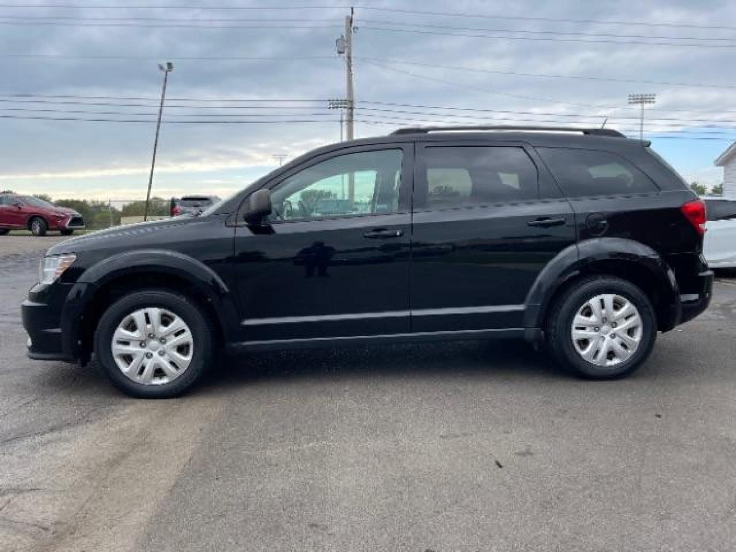 2016 Pitch Black Clear Coat Dodge Journey SE AWD (3C4PDDAG6GT) with an 3.6L V6 DOHC 24V engine, 6-Speed Automatic transmission, located at 1865 W 2nd St., Xenia, OH, 45385, (937) 372-7777, 39.681259, -83.961945 - Photo#5