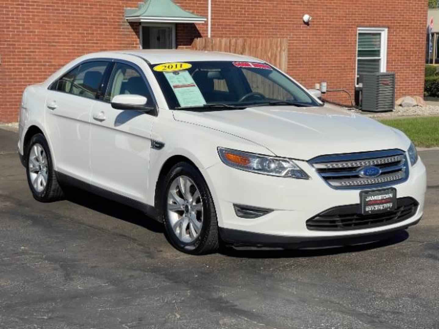 2011 White Suede Ford Taurus SEL FWD (1FAHP2EW5BG) with an 3.5L V6 DOHC 24V engine, 6-Speed Automatic transmission, located at 1865 W 2nd St., Xenia, OH, 45385, (937) 372-7777, 39.681259, -83.961945 - Photo#0