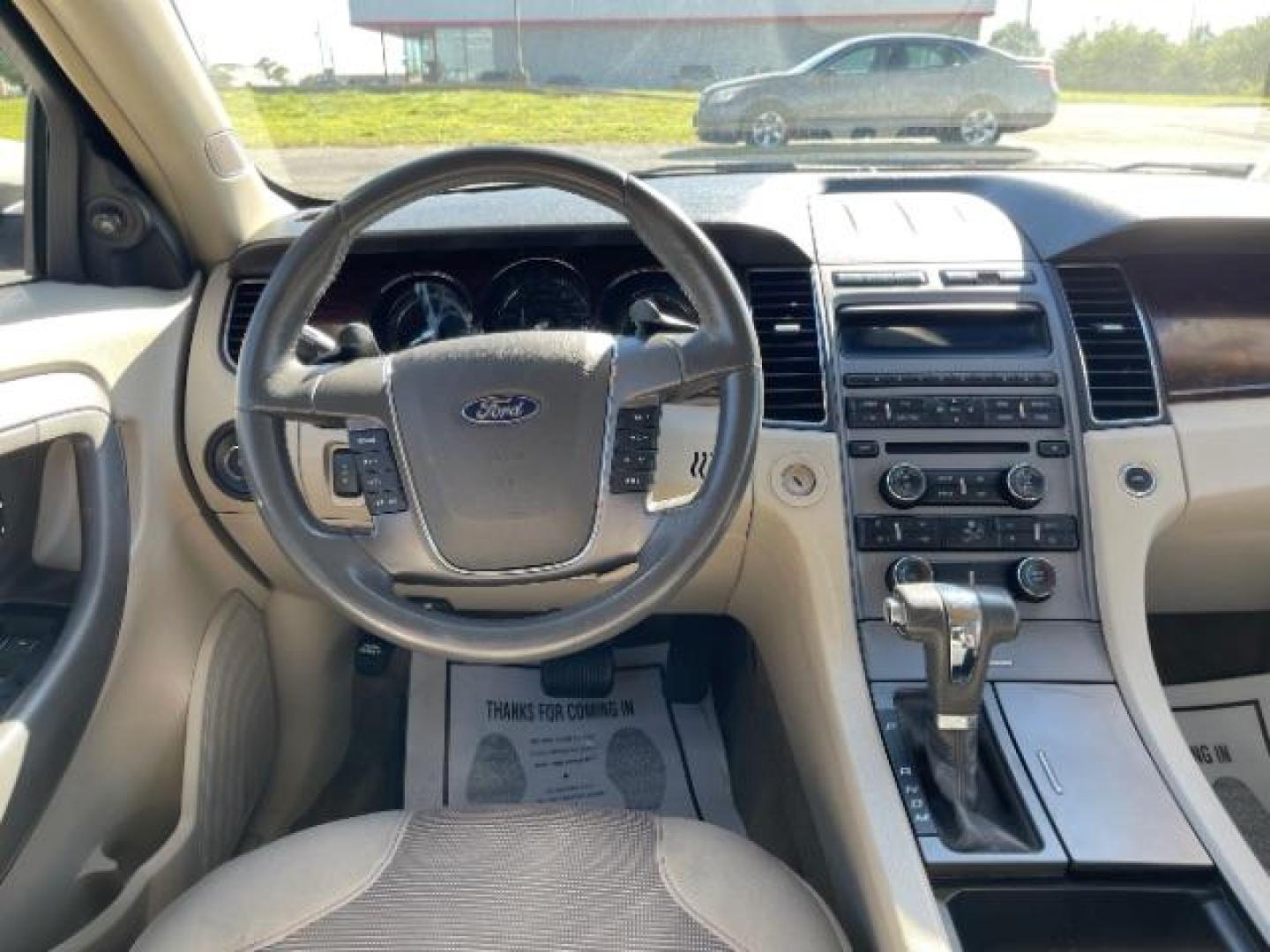 2011 White Suede Ford Taurus SEL FWD (1FAHP2EW5BG) with an 3.5L V6 DOHC 24V engine, 6-Speed Automatic transmission, located at 1865 W 2nd St., Xenia, OH, 45385, (937) 372-7777, 39.681259, -83.961945 - Photo#7