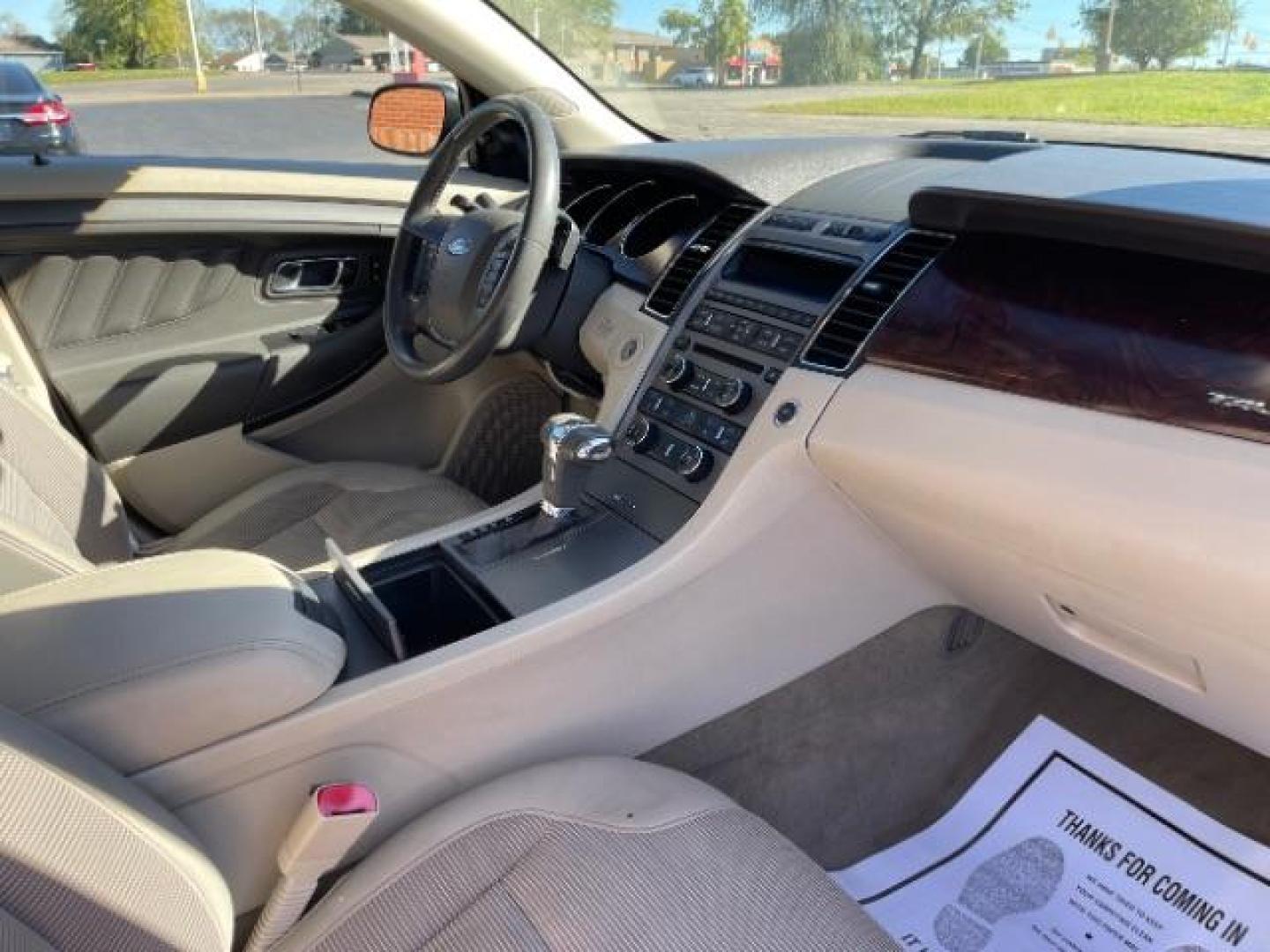 2011 White Suede Ford Taurus SEL FWD (1FAHP2EW5BG) with an 3.5L V6 DOHC 24V engine, 6-Speed Automatic transmission, located at 1865 W 2nd St., Xenia, OH, 45385, (937) 372-7777, 39.681259, -83.961945 - Photo#8