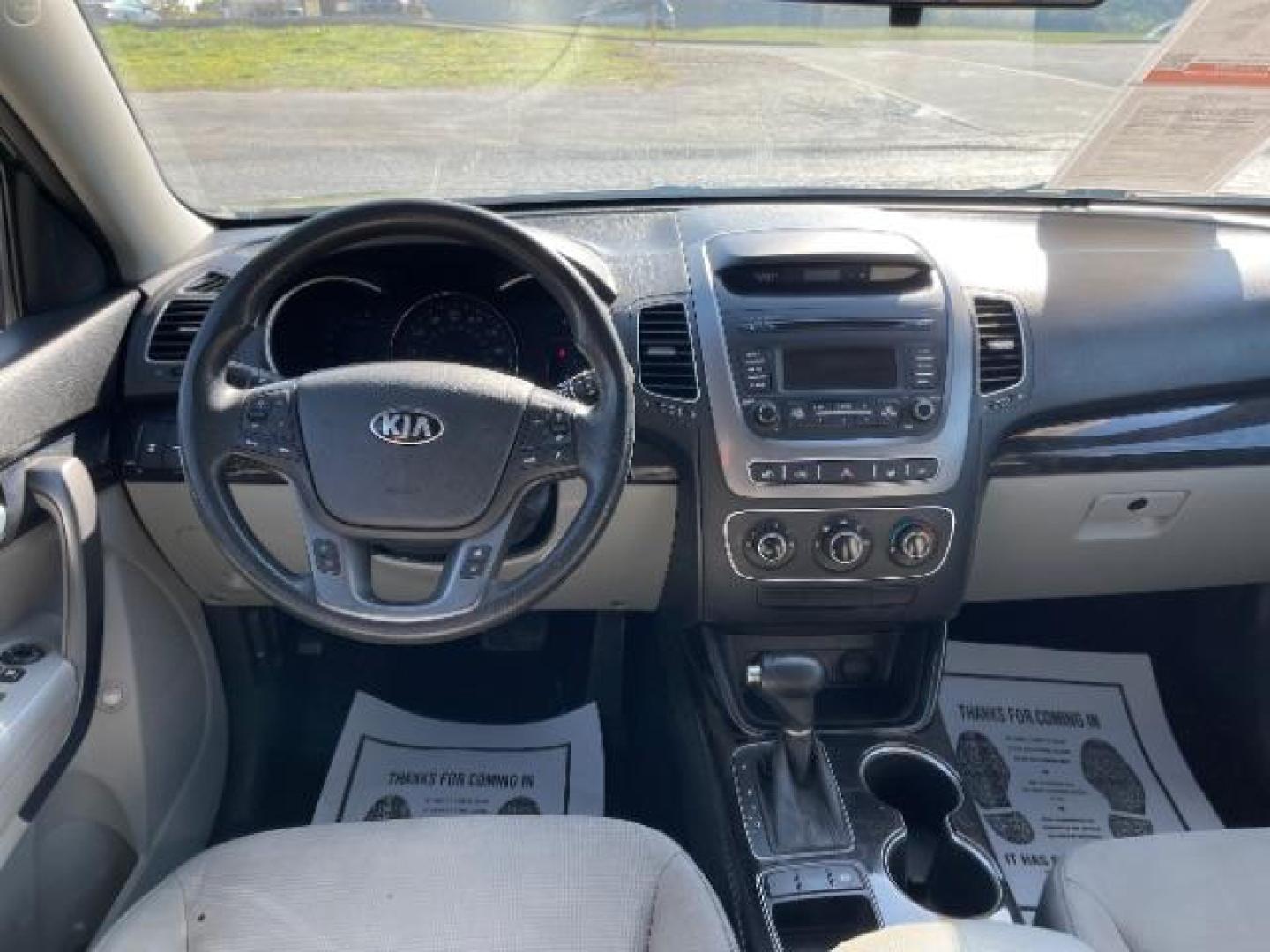 2014 Black Kia Sorento LX 2WD (5XYKT3A65EG) with an 2.4L L4 DOHC 16V engine, 6-Speed Automatic transmission, located at 1865 W 2nd St., Xenia, OH, 45385, (937) 372-7777, 39.681259, -83.961945 - Photo#8