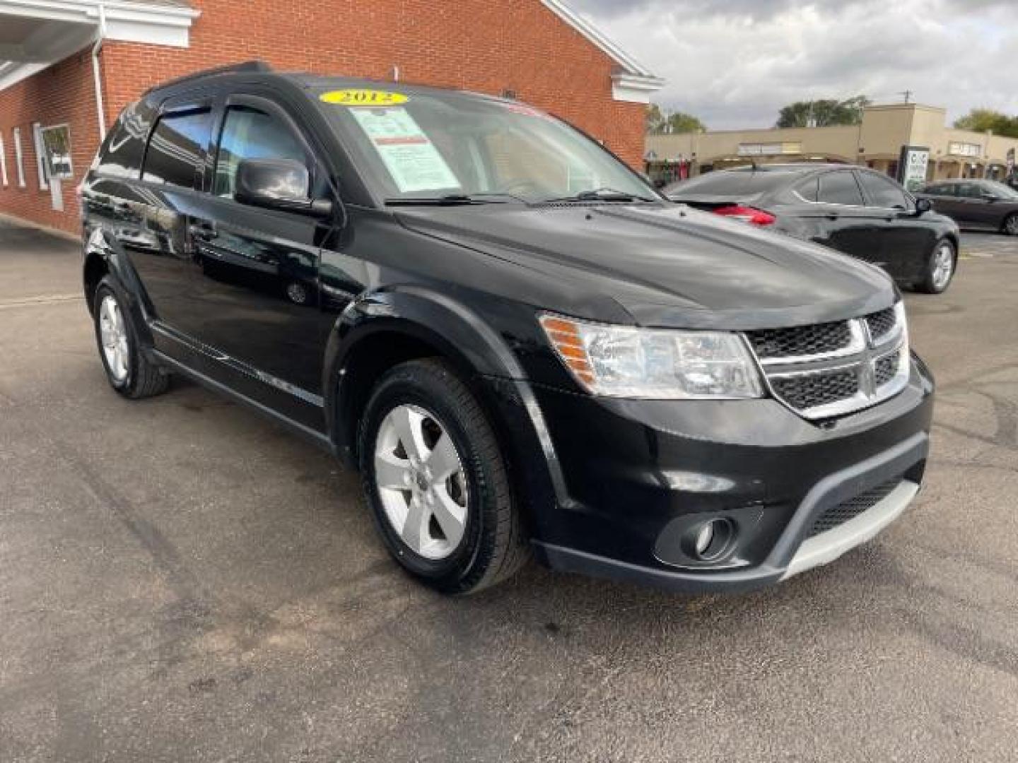 2012 Brilliant Black Crystal Pearl Dodge Journey SXT (3C4PDCBG9CT) with an 3.6L V6 DOHC 24V engine, 6-Speed Automatic transmission, located at 1865 W 2nd St., Xenia, OH, 45385, (937) 372-7777, 39.681259, -83.961945 - Photo#0